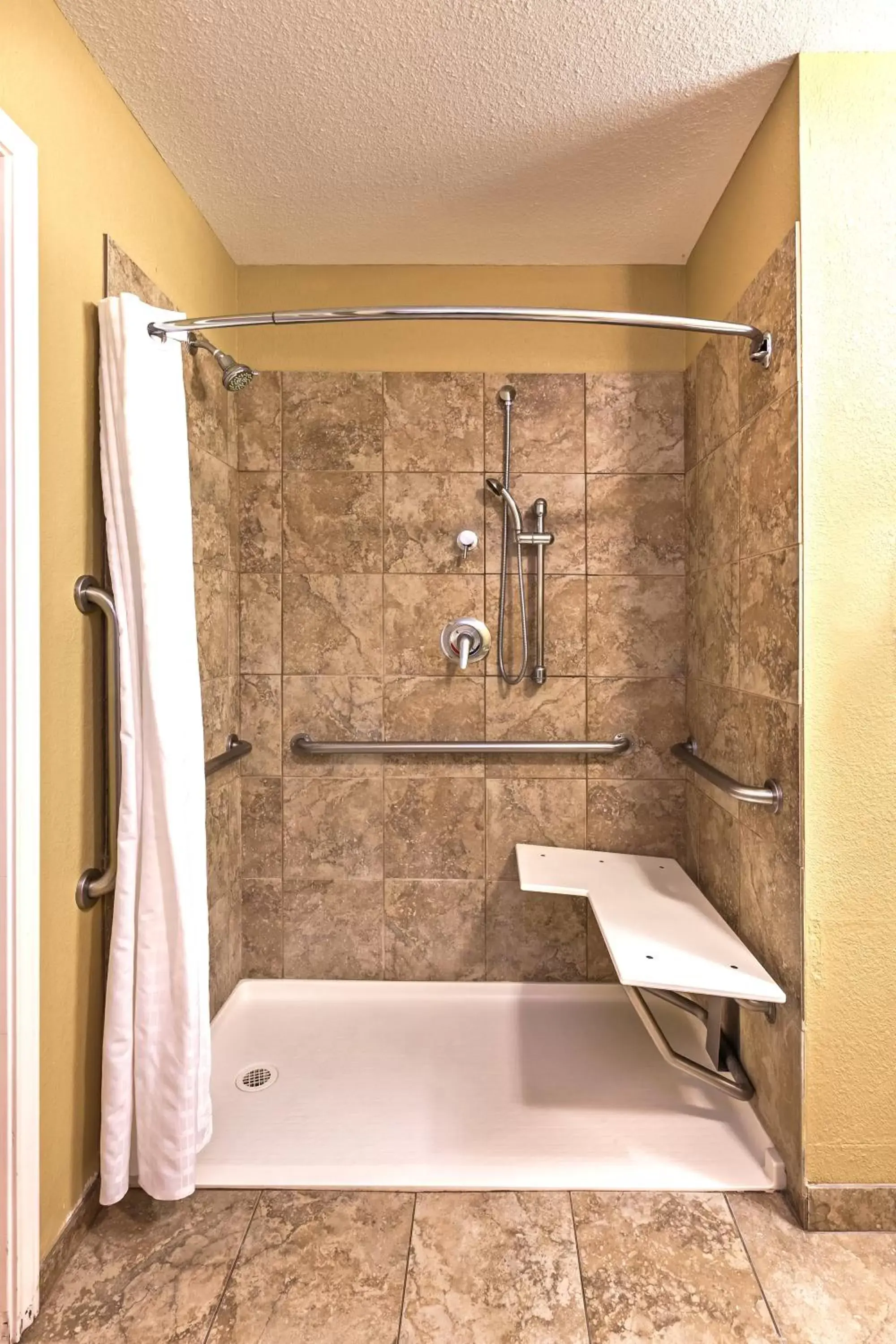 One Bedroom Suite with Queen Bed and Hearing Accessible Roll In Shower - Non-Smoking in Candlewood Suites Pearland, an IHG Hotel One Bedroom Suite with Queen Bed and Hearing Accessible Roll In Shower - Non-Smoking in Candlewood Suites Pearland, an IHG Hotel