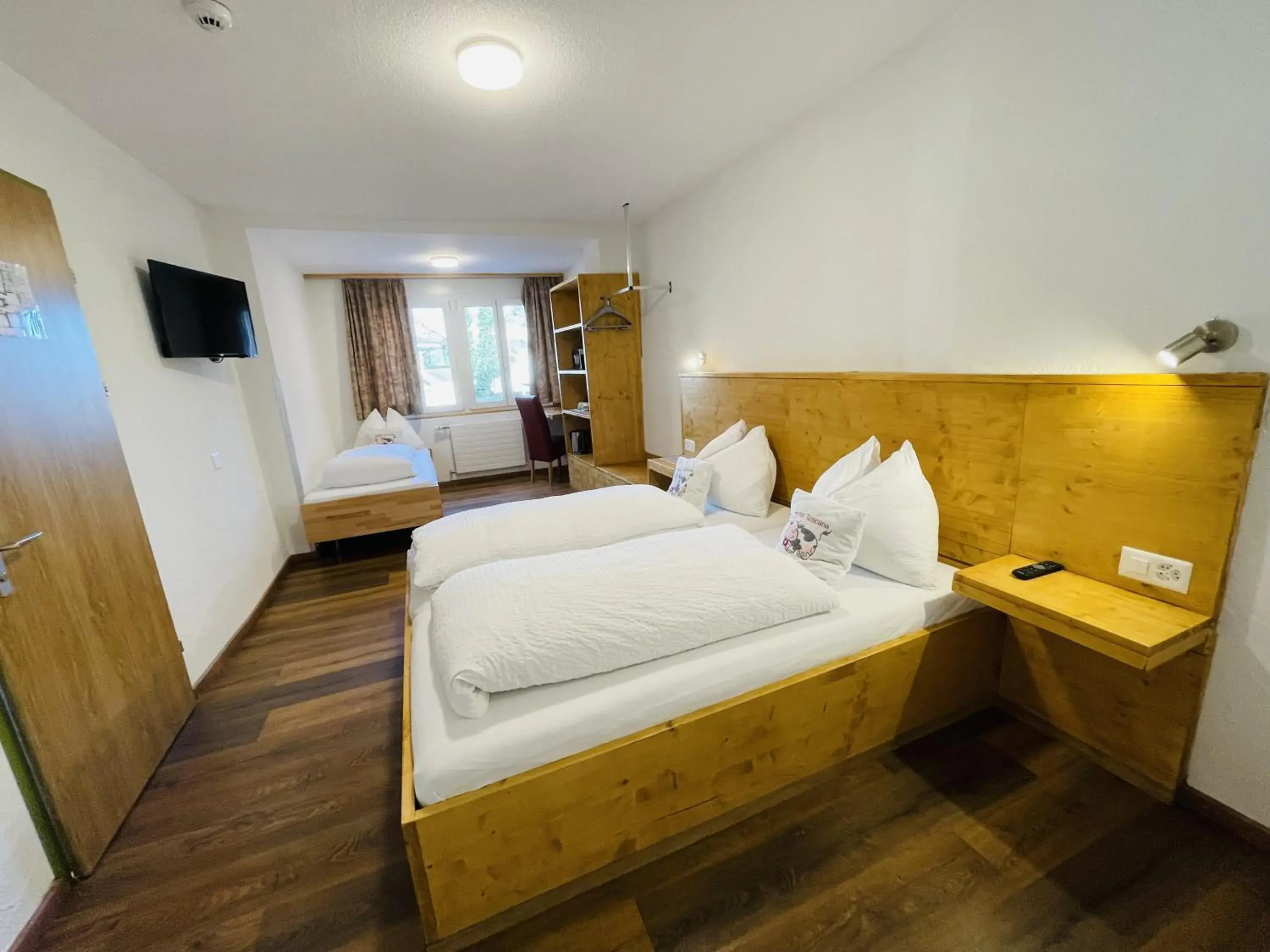 Basic Triple Room in Hotel Toscana Basic Triple Room in Hotel Toscana