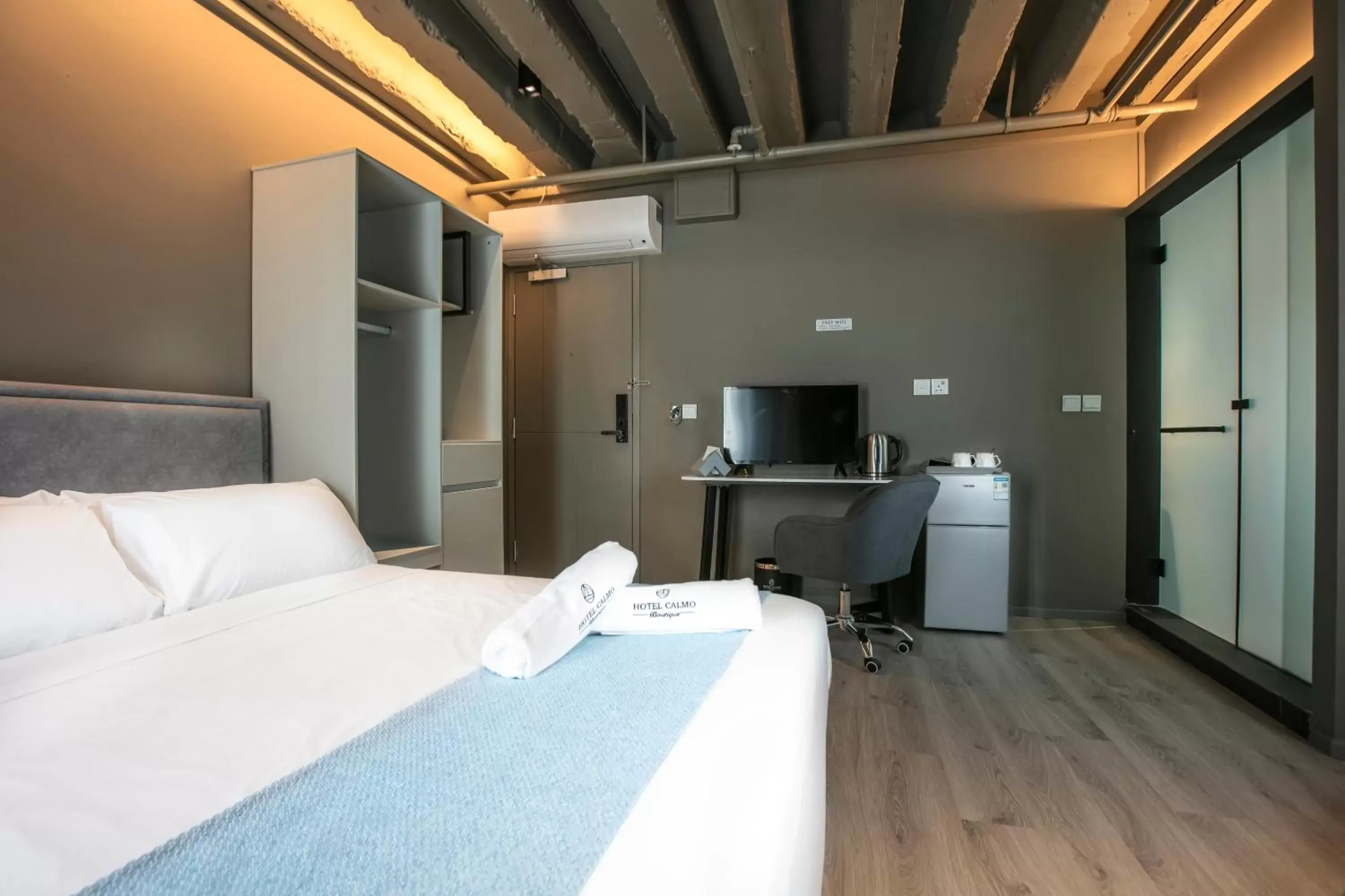 Deluxe Triple Room in Hotel Calmo Bugis Deluxe Triple Room in Hotel Calmo Bugis