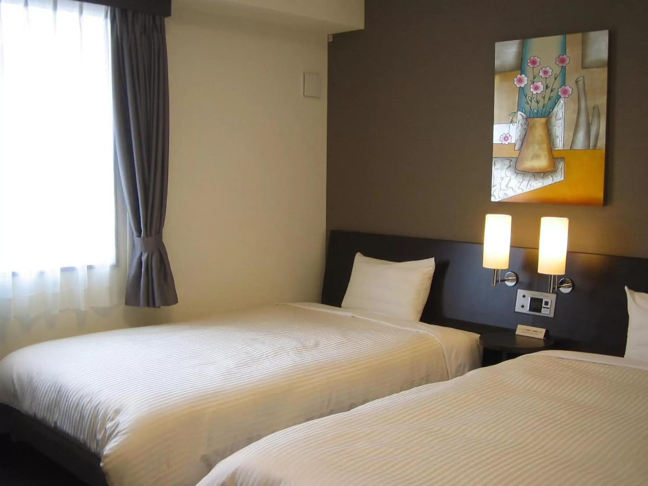 Twin Room - Non-Smoking in Hotel Route-Inn Kitakyushu-Wakamatsu Ekihigashi Twin Room - Non-Smoking in Hotel Route-Inn Kitakyushu-Wakamatsu Ekihigashi