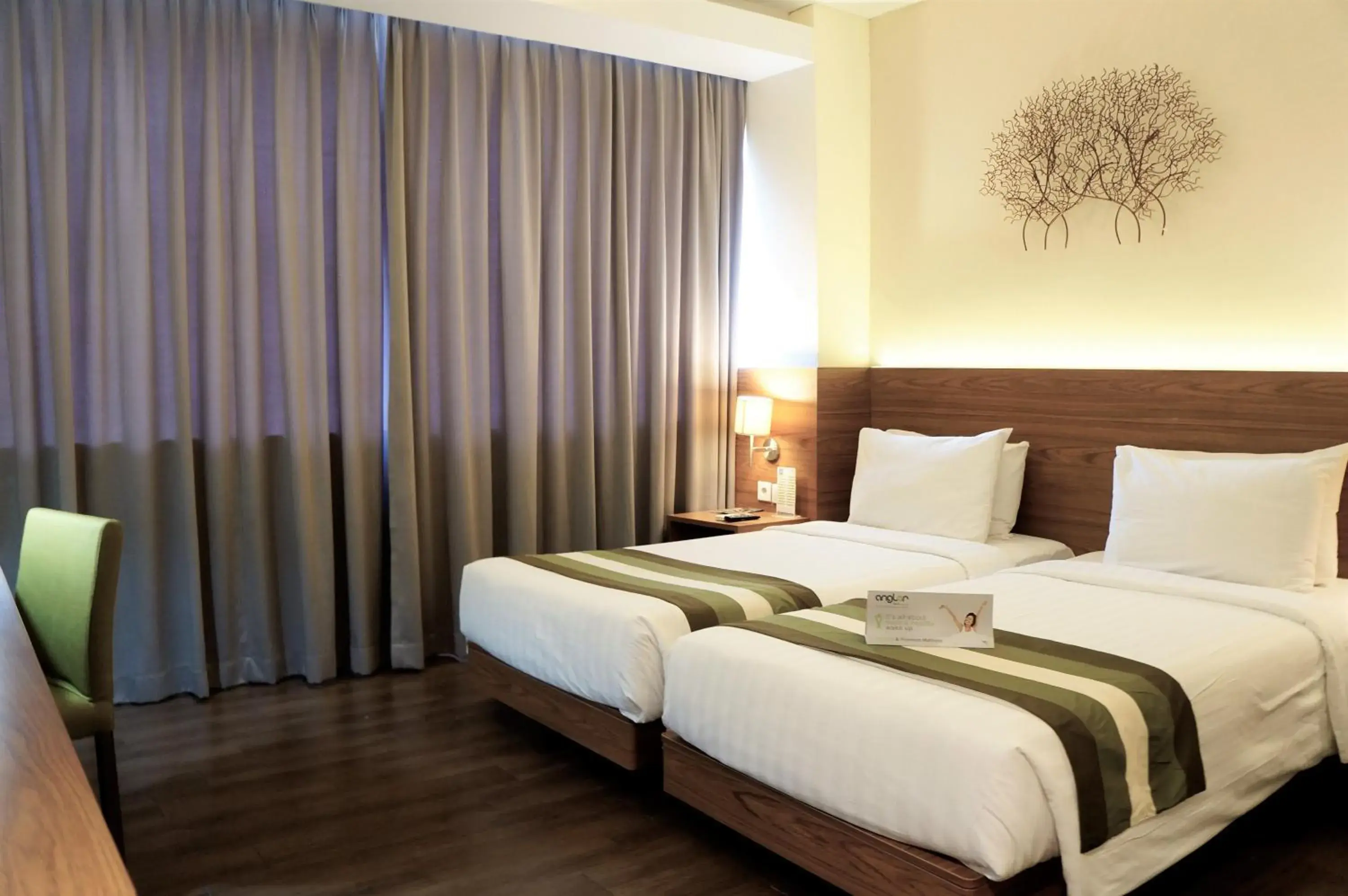 Deluxe Twin Room in Grand Whiz Poins Simatupang Jakarta Deluxe Twin Room in Grand Whiz Poins Simatupang Jakarta