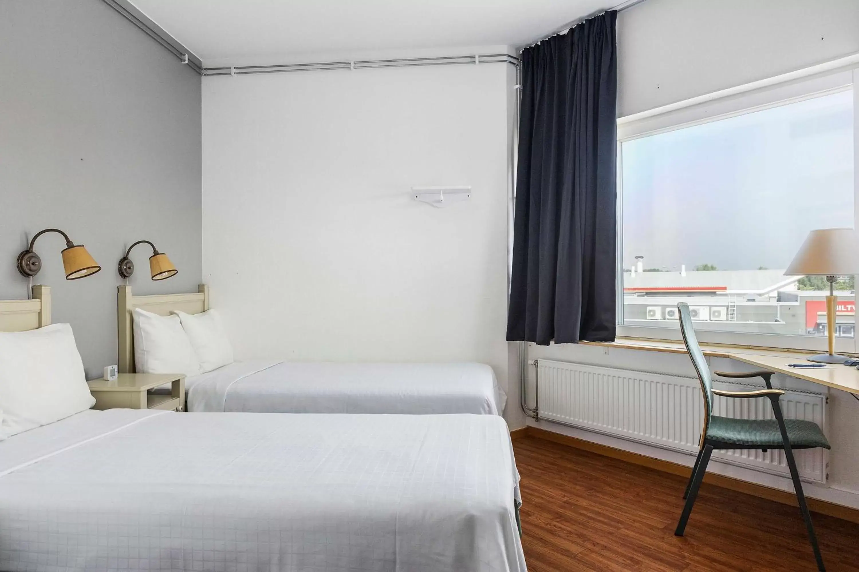 Standard Quadruple Room with Two Single Beds - Non-Smoking in Best Western Eurostop Orebro Standard Quadruple Room with Two Single Beds - Non-Smoking in Best Western Eurostop Orebro