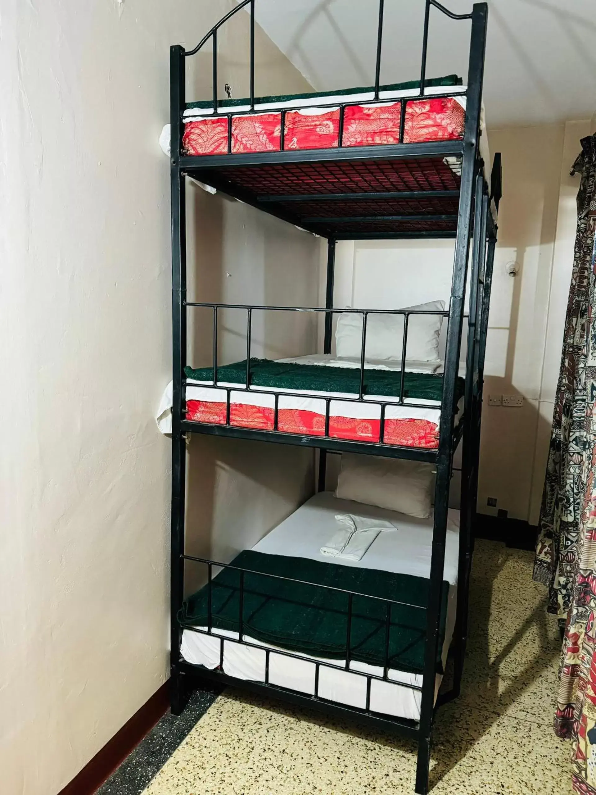 Standard Triple Room in Arusha Backpackers Hotel Standard Triple Room in Arusha Backpackers Hotel