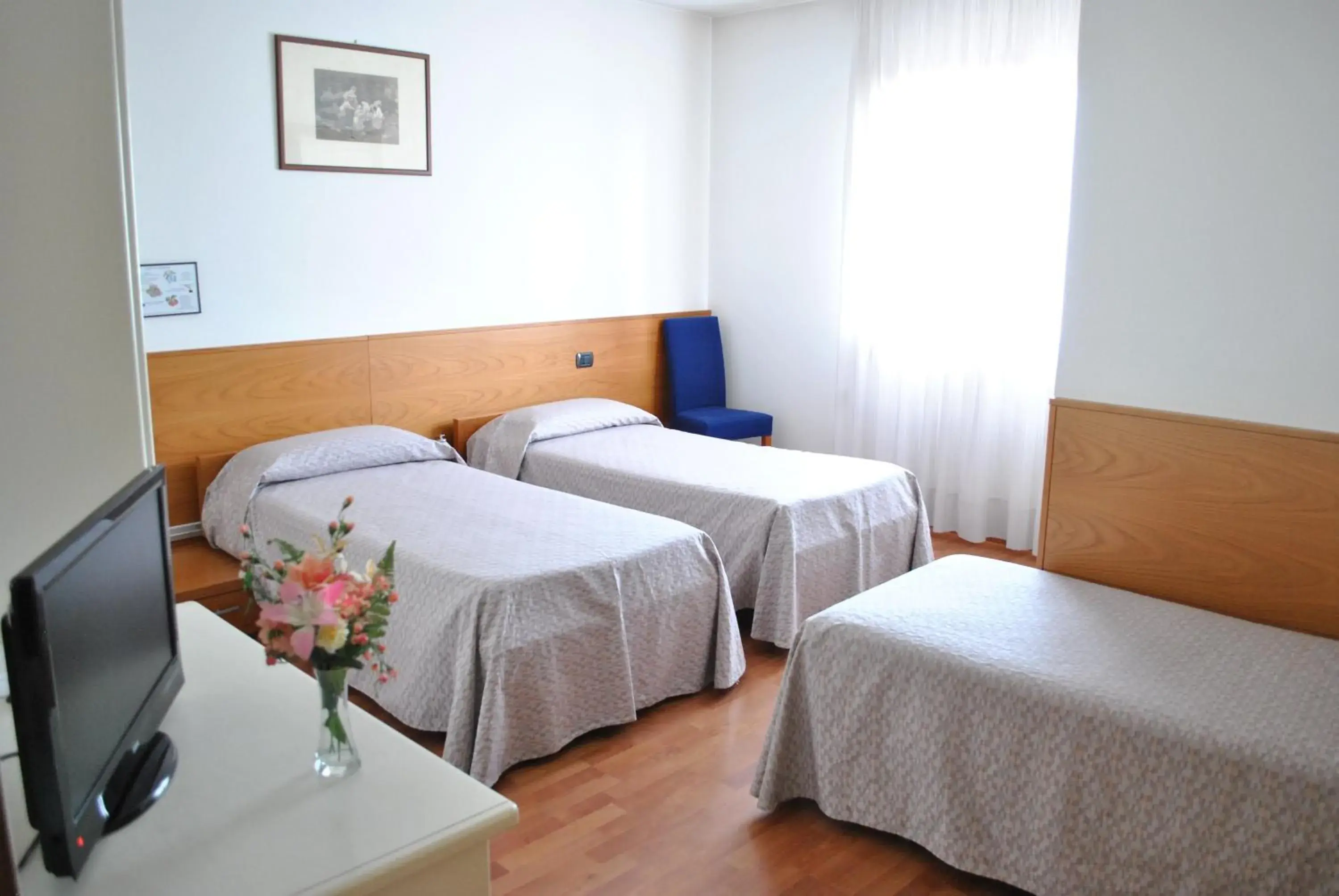 Quadruple Room in Rometta Hotel Quadruple Room in Rometta Hotel