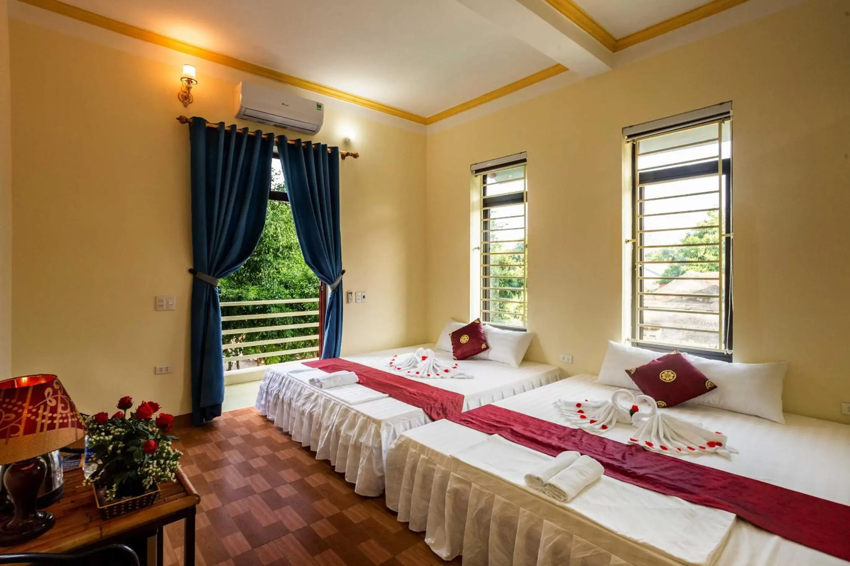 Quadruple Room with Mountain View in Hang Mua Central Homestay Quadruple Room with Mountain View in Hang Mua Central Homestay