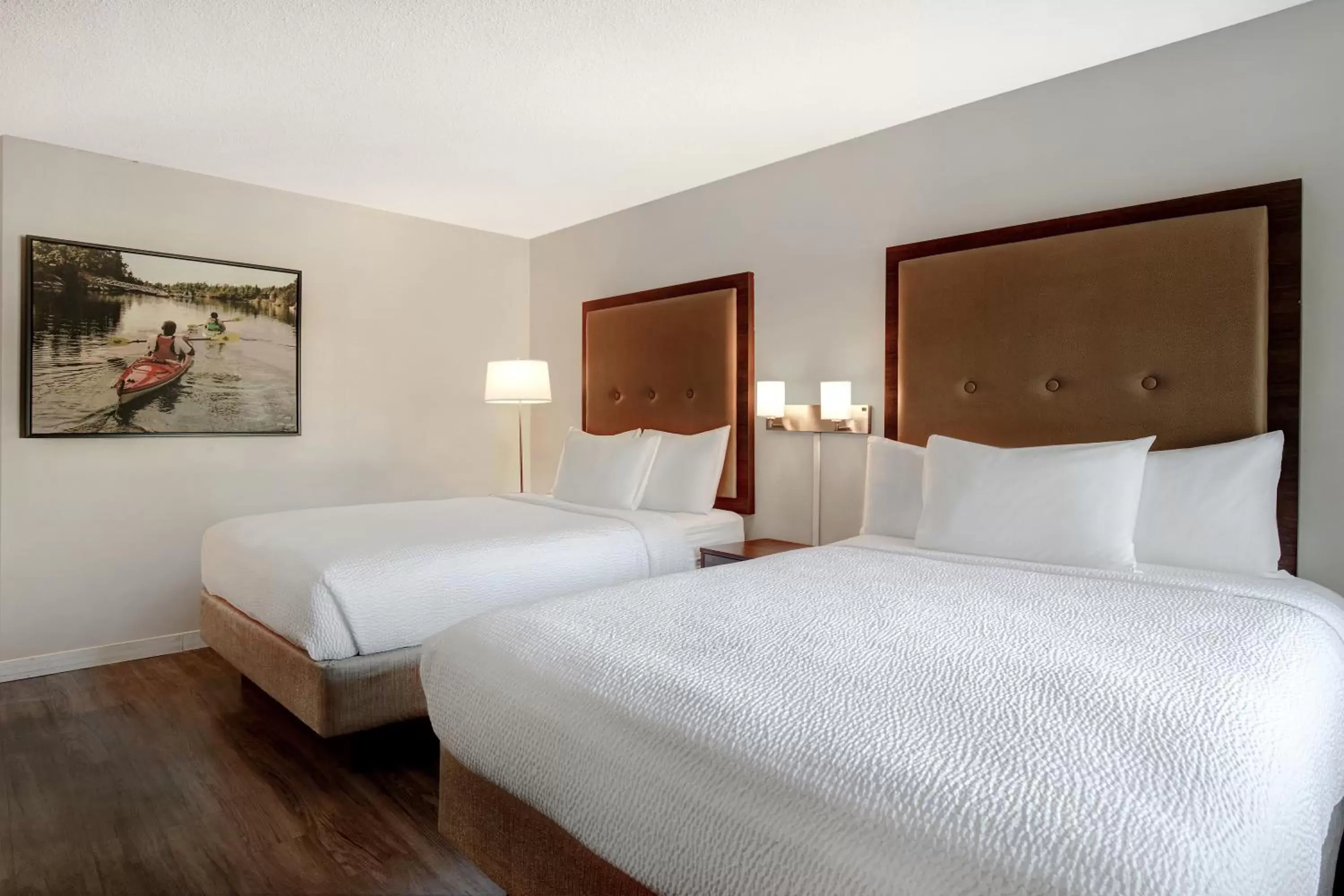 Economy Queen Room with Three Queen Beds - Non-Smoking in Days Inn by Wyndham Victoria Uptown Economy Queen Room with Three Queen Beds - Non-Smoking in Days Inn by Wyndham Victoria Uptown