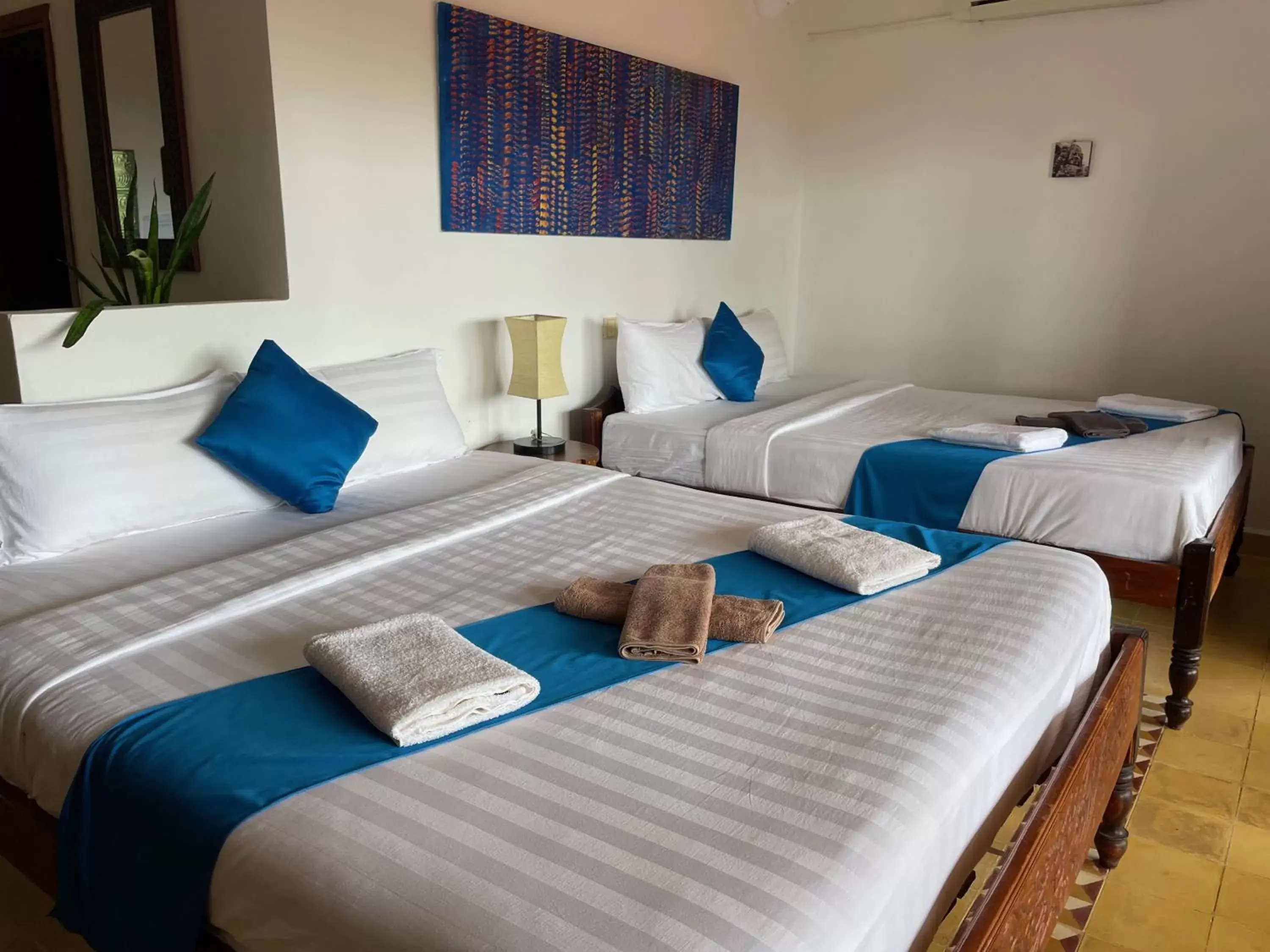 Quadruple Room with Balcony in Kep Lodge Quadruple Room with Balcony in Kep Lodge