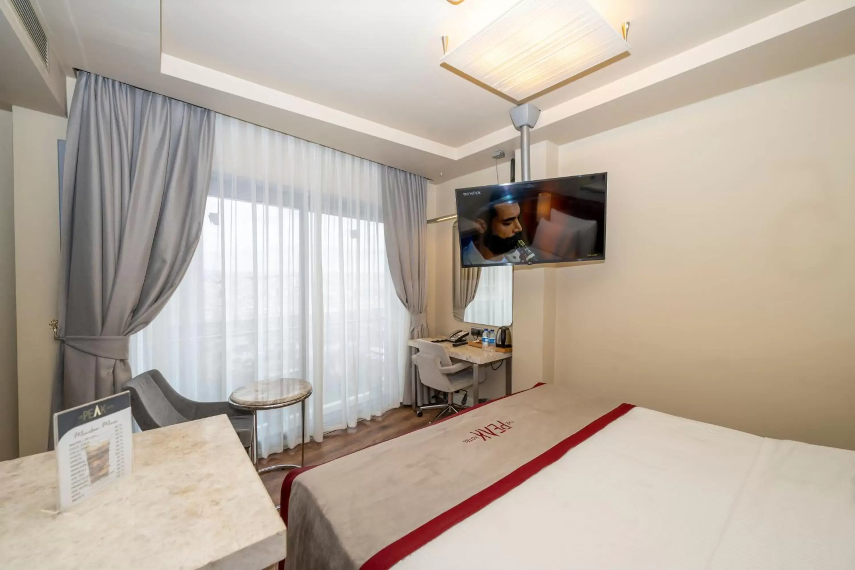 Deluxe Double Room with Balcony in Ramada By Wyndham Istanbul Pera Taksim Deluxe Double Room with Balcony in Ramada By Wyndham Istanbul Pera Taksim
