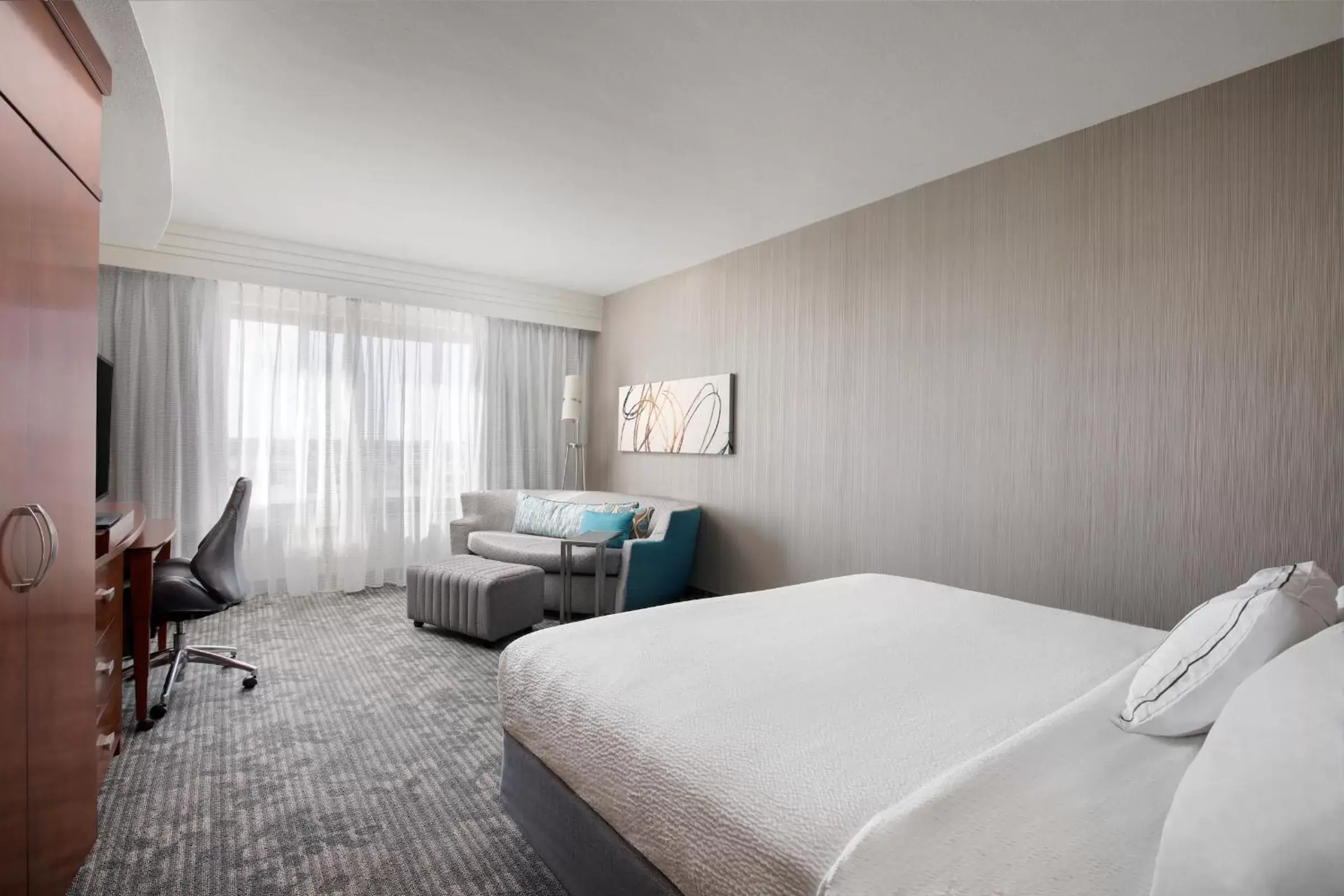 King Room with Sofa Bed and Balcony in Courtyard by Marriott Fort Smith Downtown King Room with Sofa Bed and Balcony in Courtyard by Marriott Fort Smith Downtown