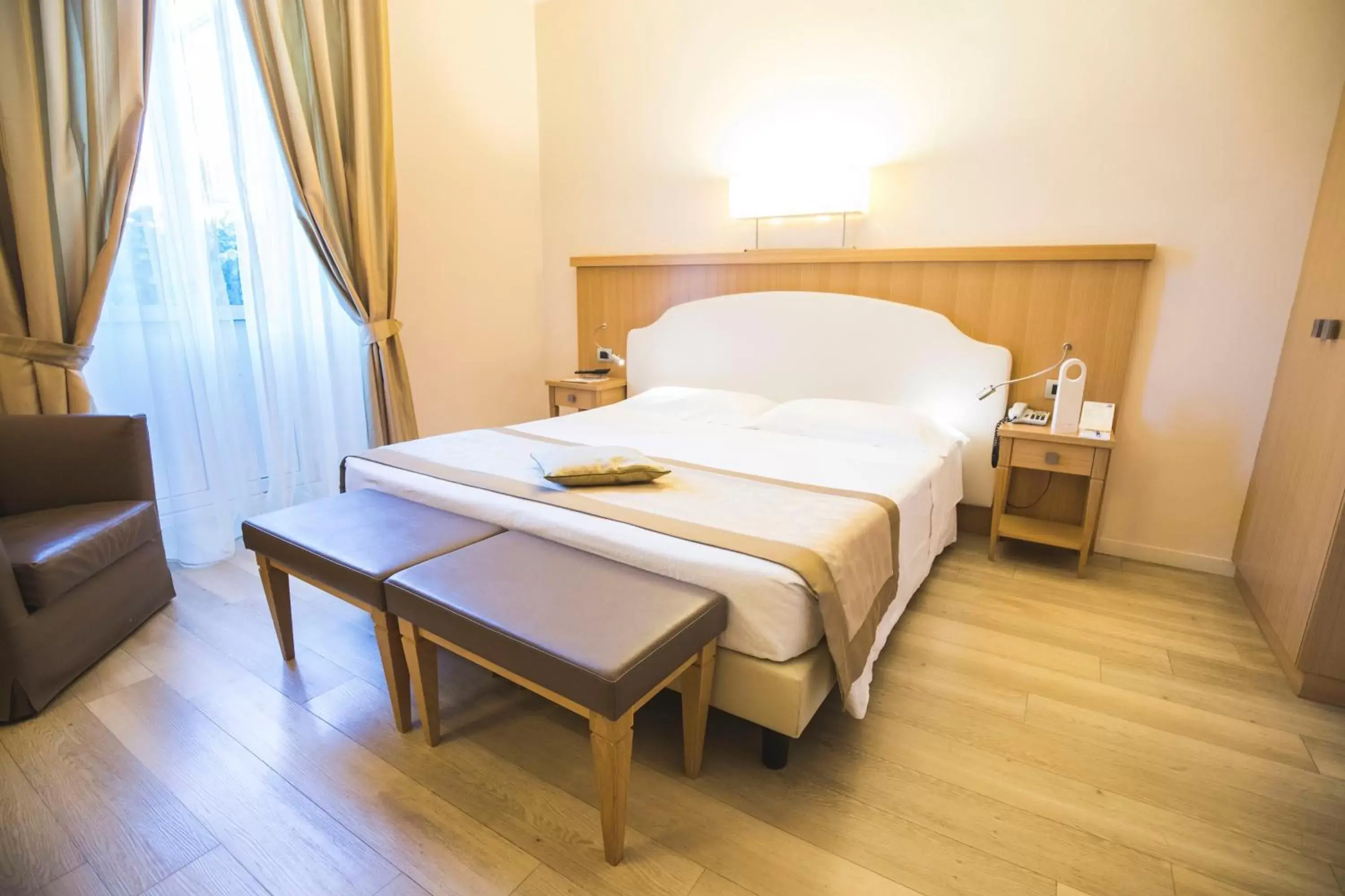 Deluxe Double Room with Balcony and Lateral Lake View and Spa Access in Hotel Sirmione Terme Deluxe Double Room with Balcony and Lateral Lake View and Spa Access in Hotel Sirmione Terme