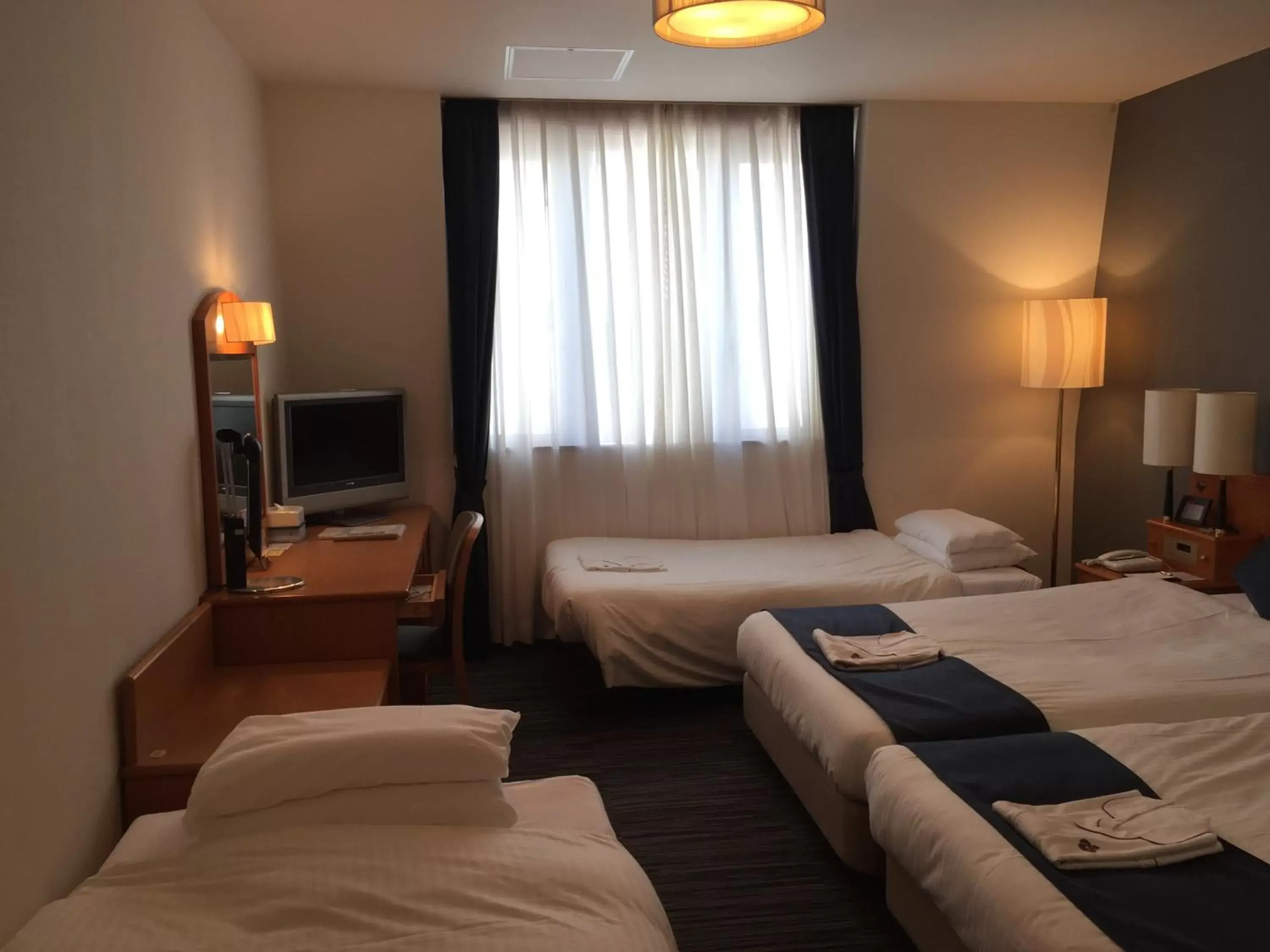 Twin Room with Two Extra Beds (4 Adults) - Non-Smoking in Okayama Koraku Hotel Twin Room with Two Extra Beds (4 Adults) - Non-Smoking in Okayama Koraku Hotel