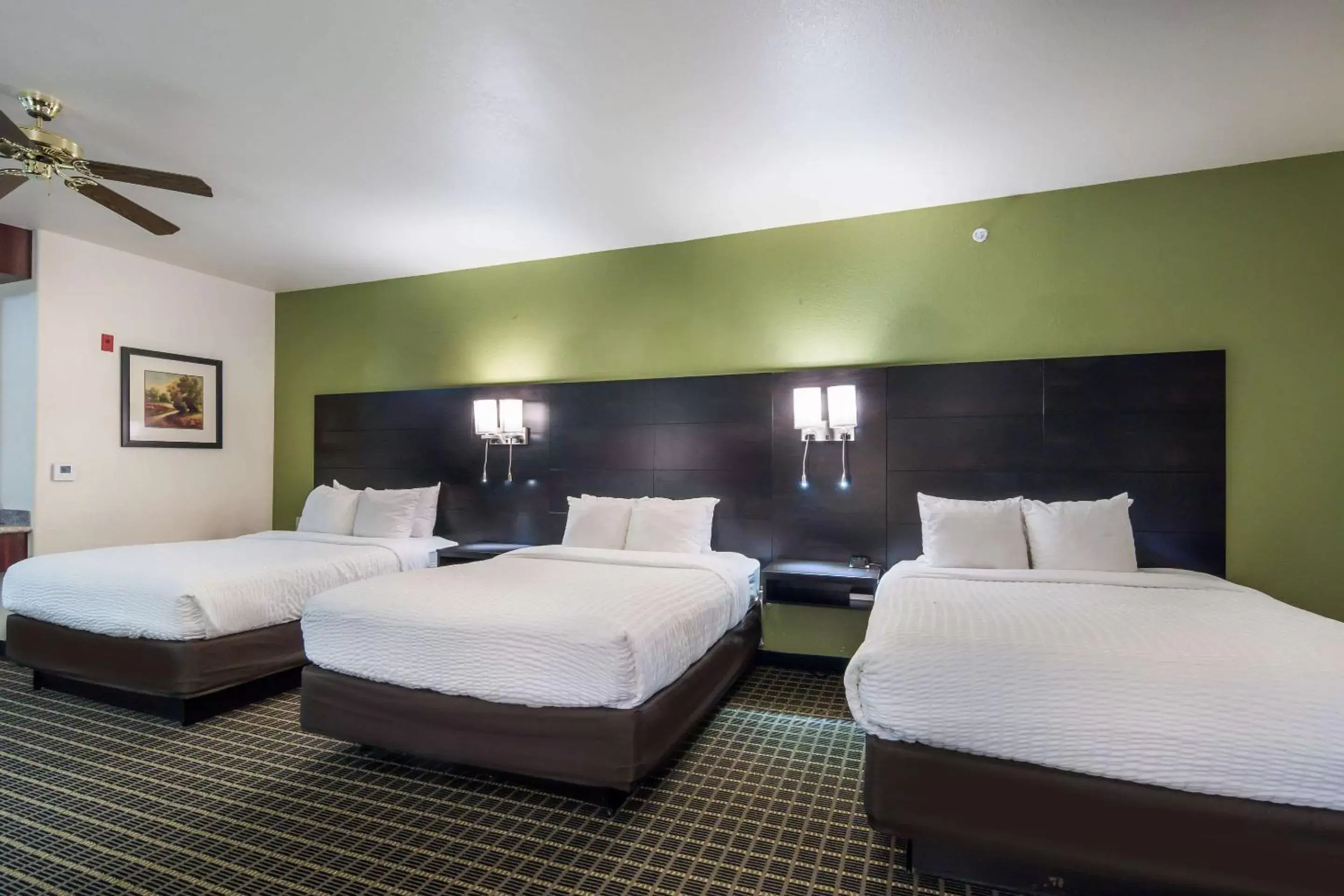Queen Suite with Three Queen Beds and Sofa Bed - Non-Smoking in Clarion Inn & Suites Weatherford South Queen Suite with Three Queen Beds and Sofa Bed - Non-Smoking in Clarion Inn & Suites Weatherford South
