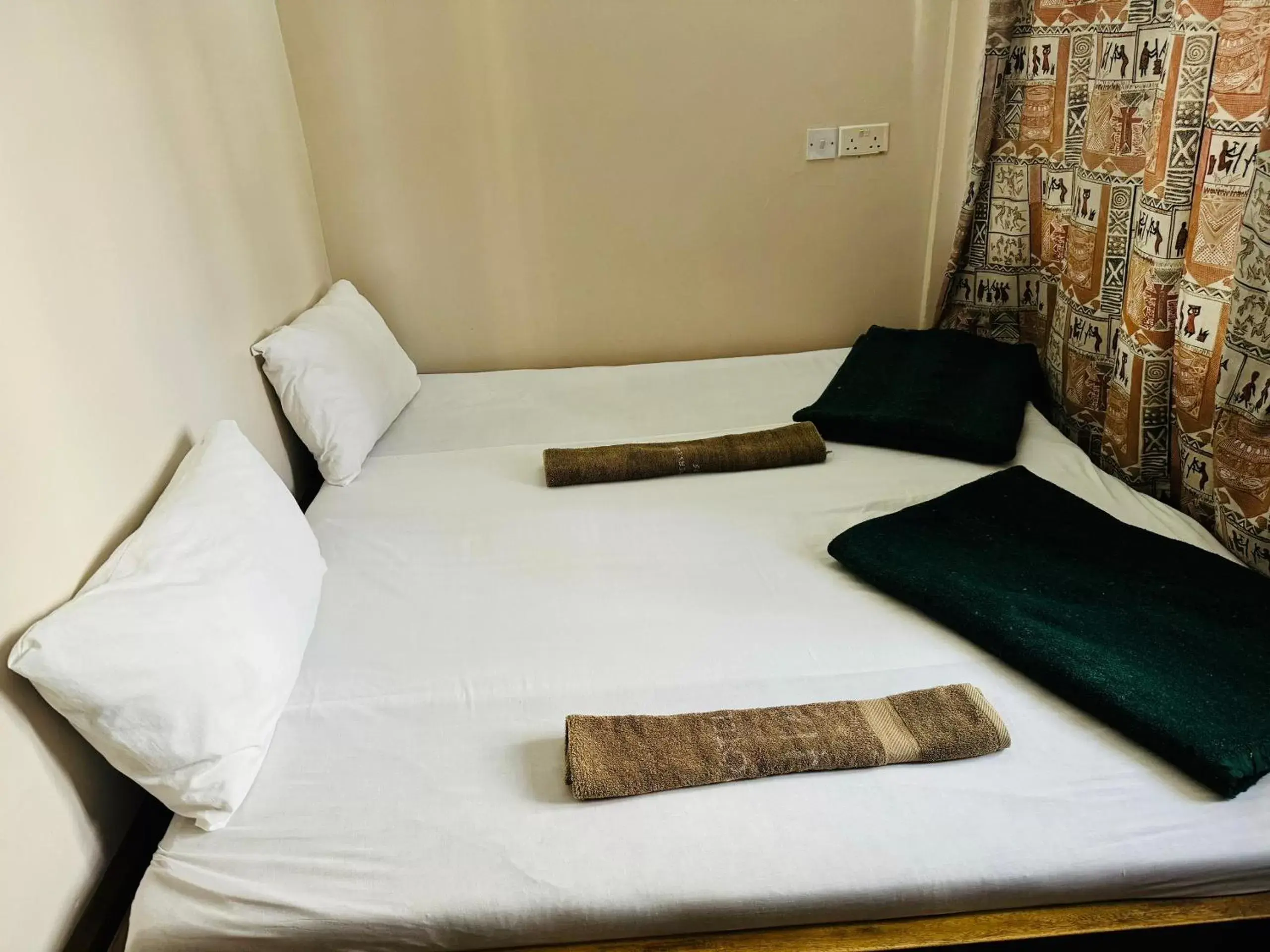 Double Room with Shared Bathroom in Arusha Backpackers Hotel Double Room with Shared Bathroom in Arusha Backpackers Hotel