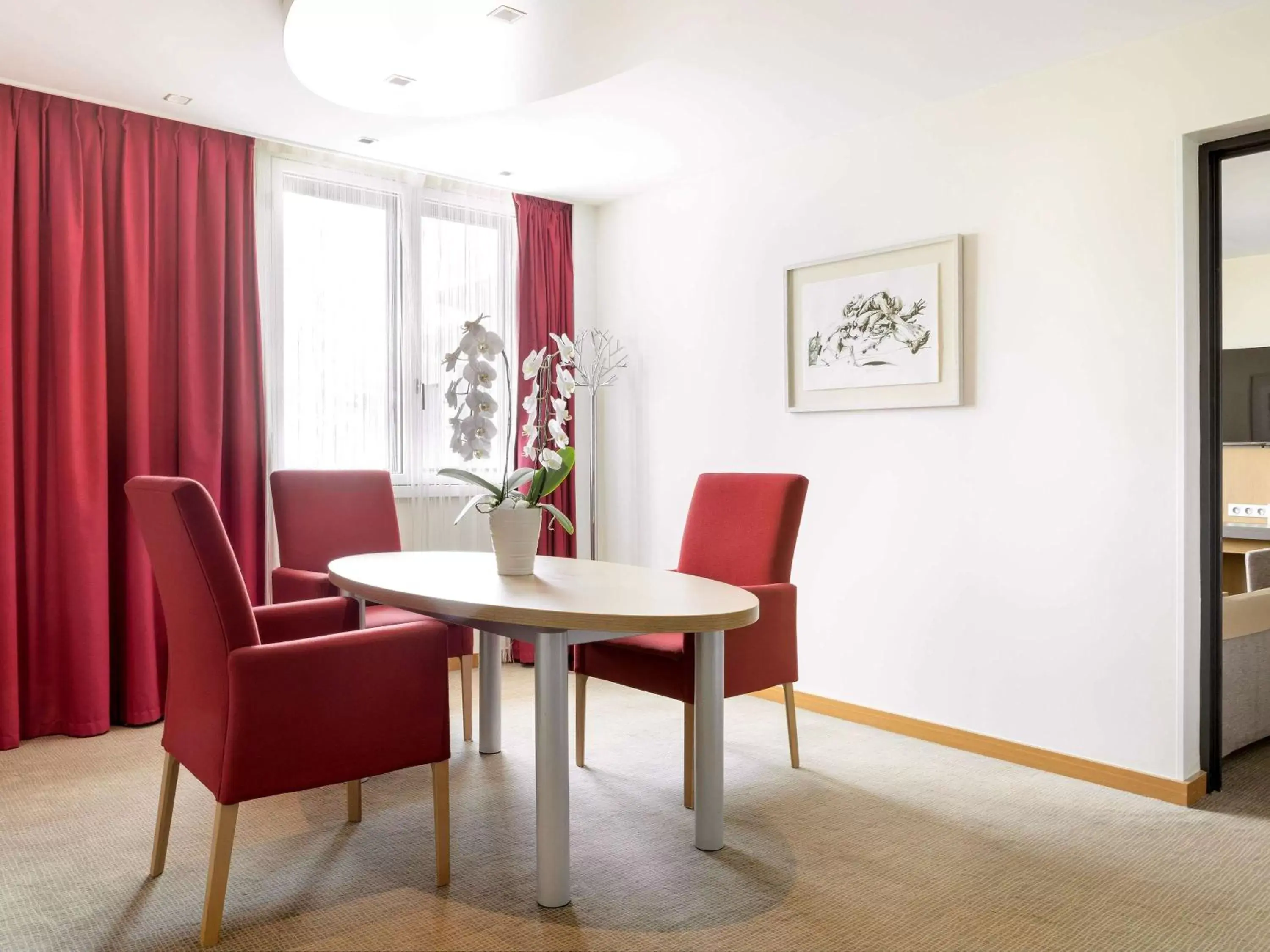 Suite with Double Bed and Sofa Bed in Novotel Paris Roissy CDG Convention Suite with Double Bed and Sofa Bed in Novotel Paris Roissy CDG Convention