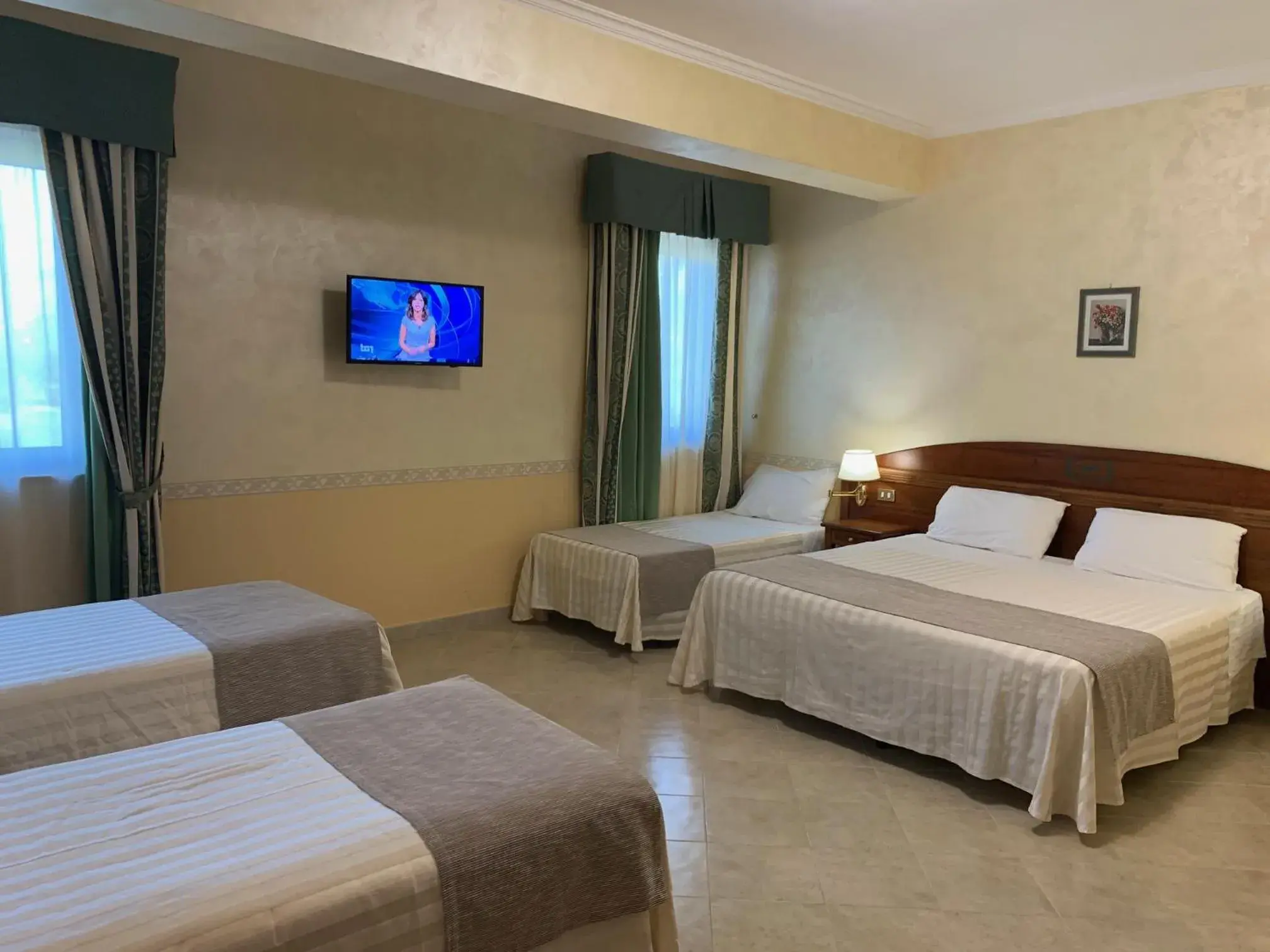 Quadruple Room - single occupancy in Hotel Ristorante Al Boschetto Quadruple Room - single occupancy in Hotel Ristorante Al Boschetto