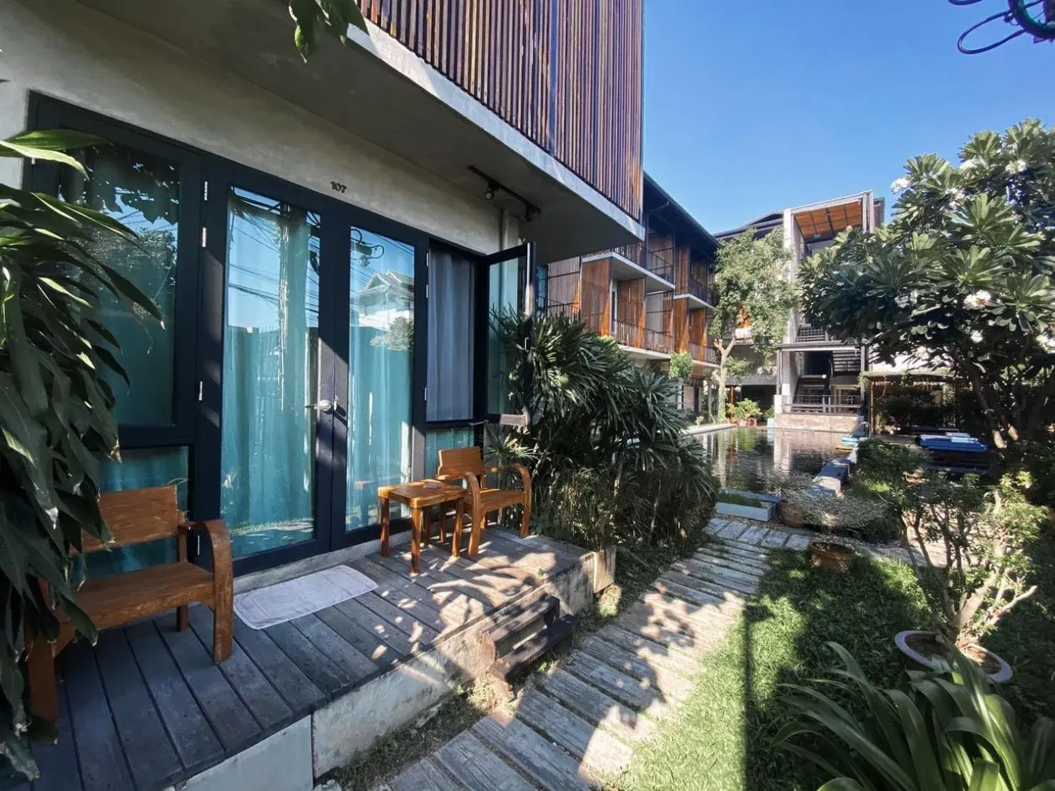 Deluxe Twin Room - Pool Side in Lamphu House Chiang Mai - SHA Extra Plus Certified Deluxe Twin Room - Pool Side in Lamphu House Chiang Mai - SHA Extra Plus Certified