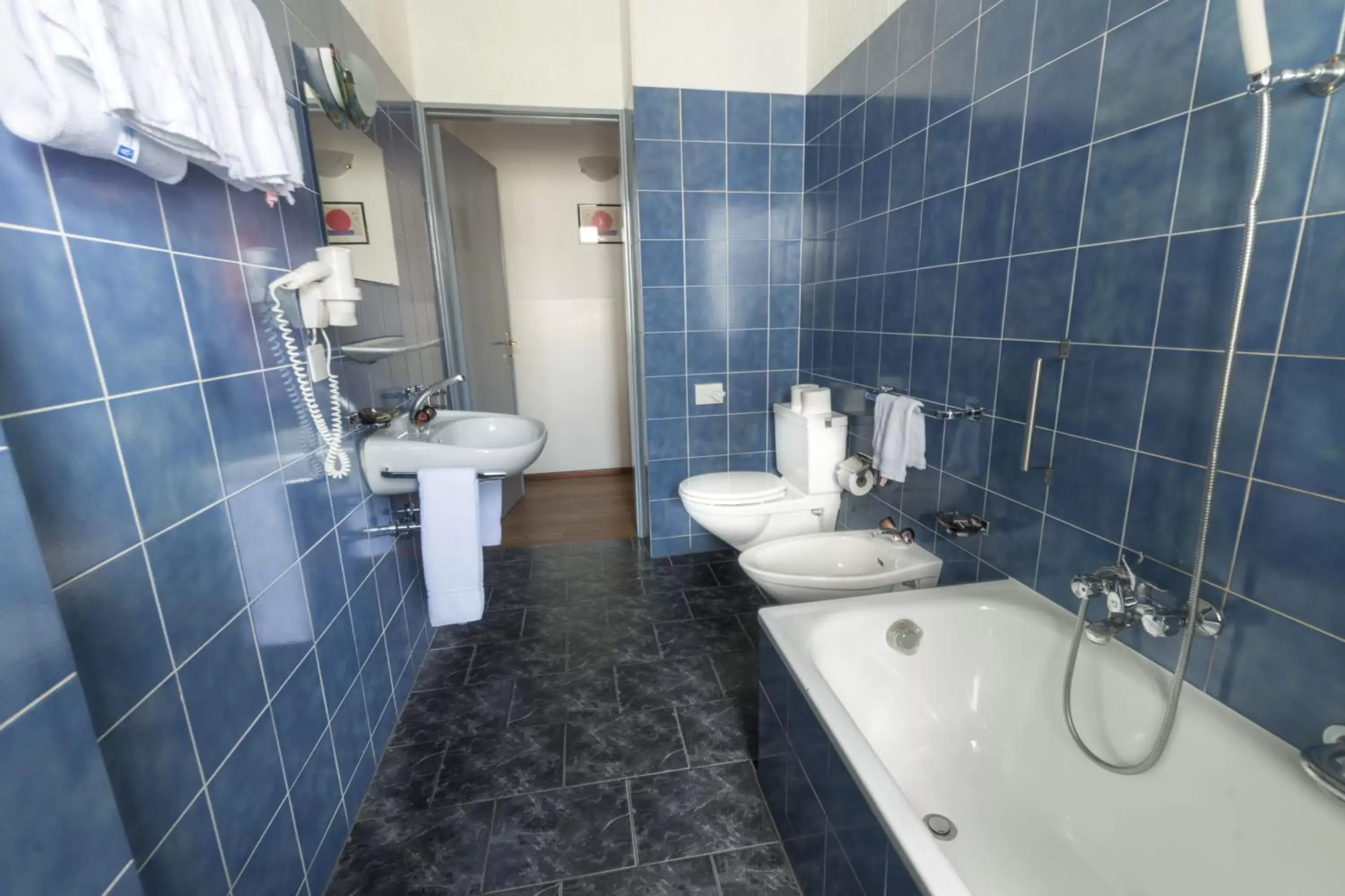 Quadruple Room with Balcony in HB Lugano Center Quadruple Room with Balcony in HB Lugano Center