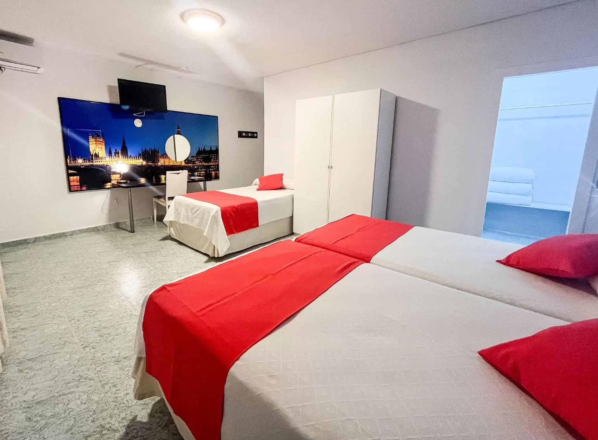 Standard Triple Room in Hotel Los Manjares Standard Triple Room in Hotel Los Manjares