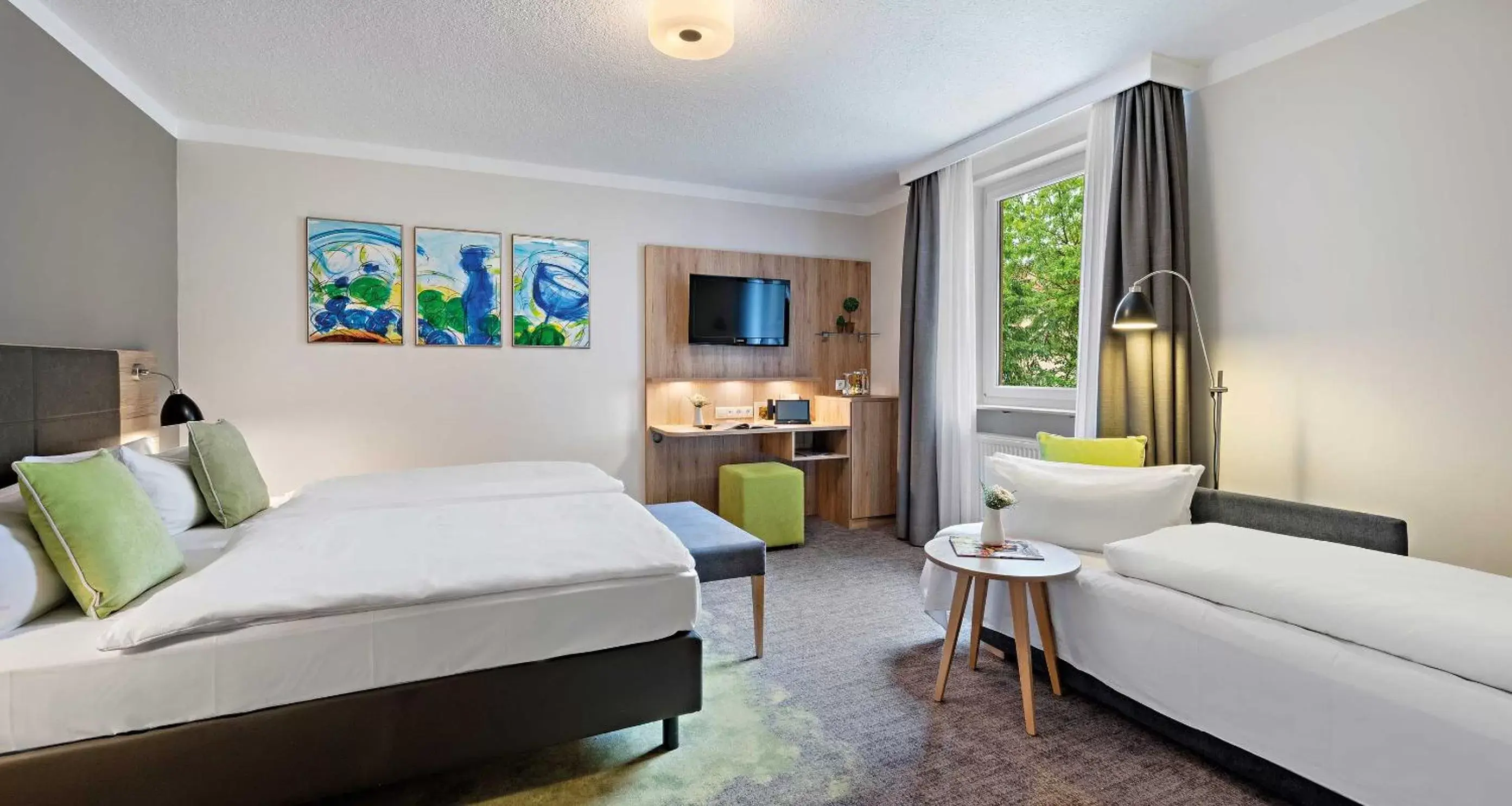 Triple Room in Pfalzhotel Asselheim Triple Room in Pfalzhotel Asselheim