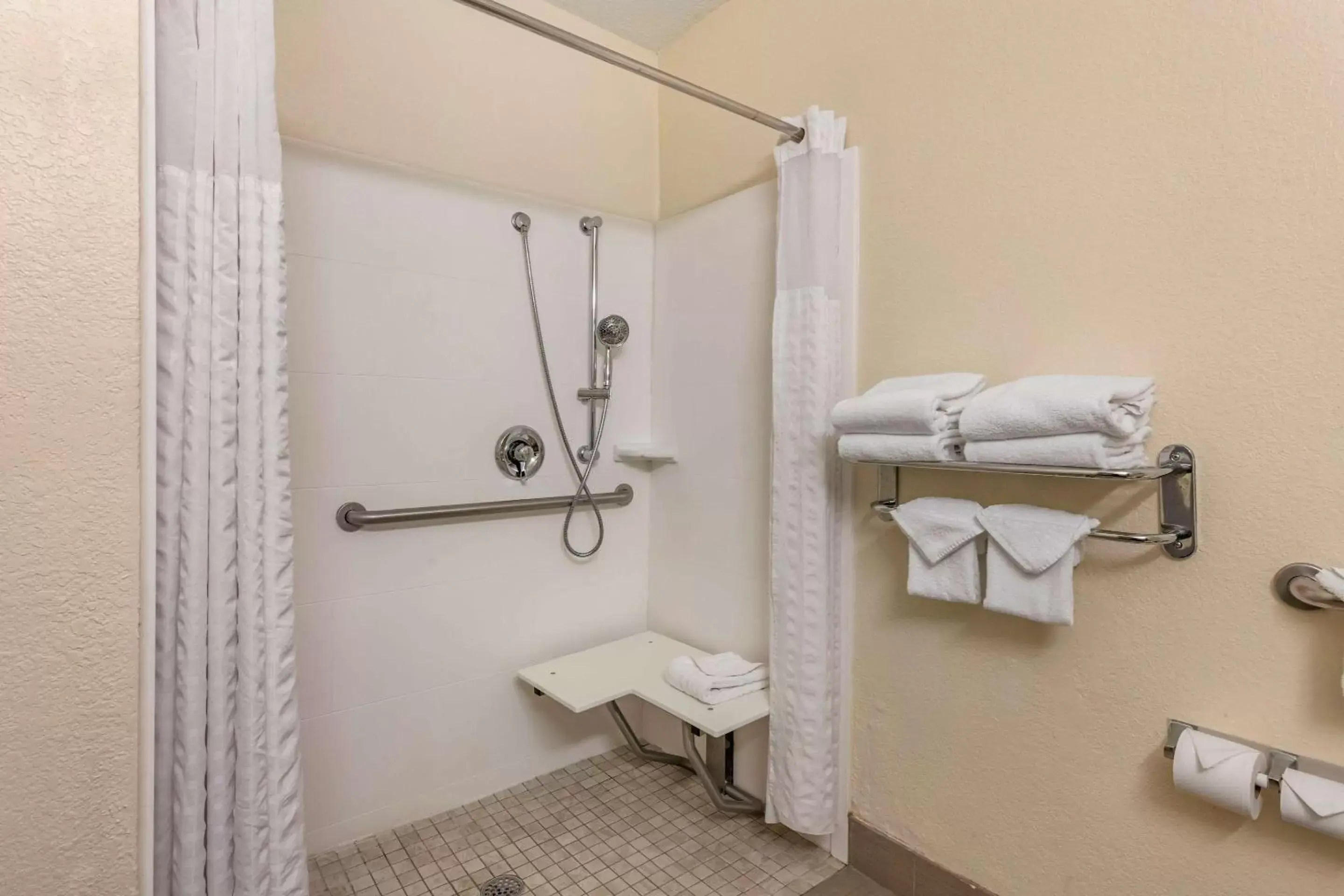 King Suite with Roll-In Shower - Accessible/Non-Smoking in Comfort Suites Maingate East King Suite with Roll-In Shower - Accessible/Non-Smoking in Comfort Suites Maingate East