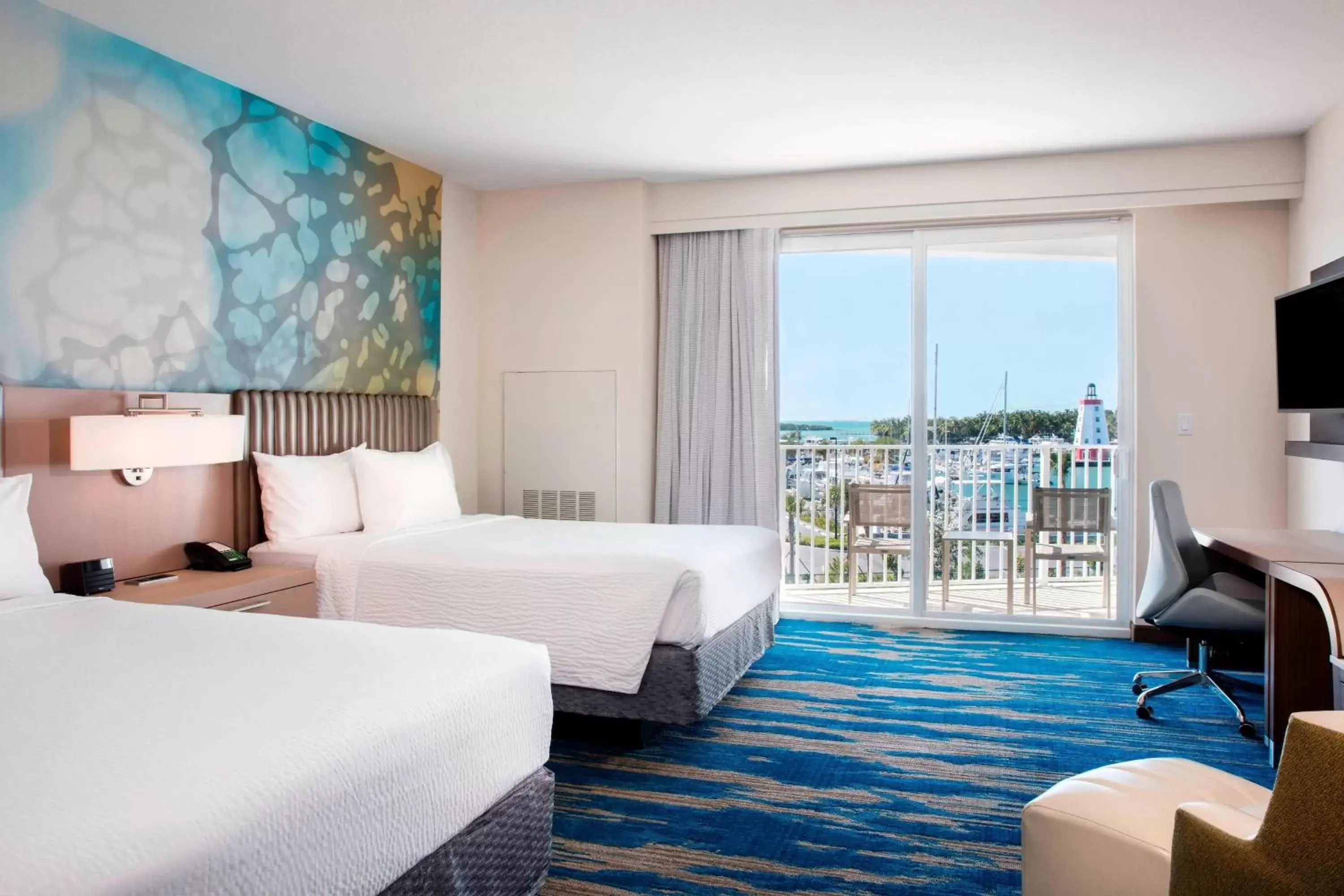 Queen Room with Two Queen Beds with Patio/Balcony and Partial Ocean View in Courtyard by Marriott Faro Blanco Resort Queen Room with Two Queen Beds with Patio/Balcony and Partial Ocean View in Courtyard by Marriott Faro Blanco Resort