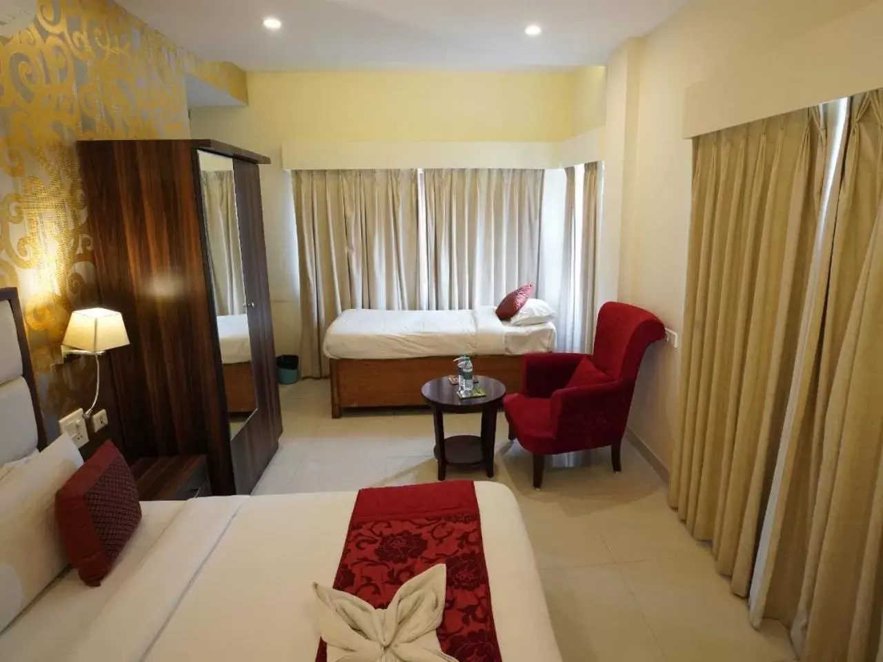 Executive Triple Room in Indira Nikunj Rubystone Exotic Executive Triple Room in Indira Nikunj Rubystone Exotic