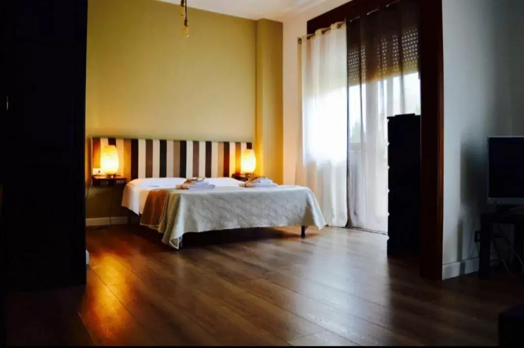 Bed in Battisti Rooms & Breakfast Bed in Battisti Rooms & Breakfast