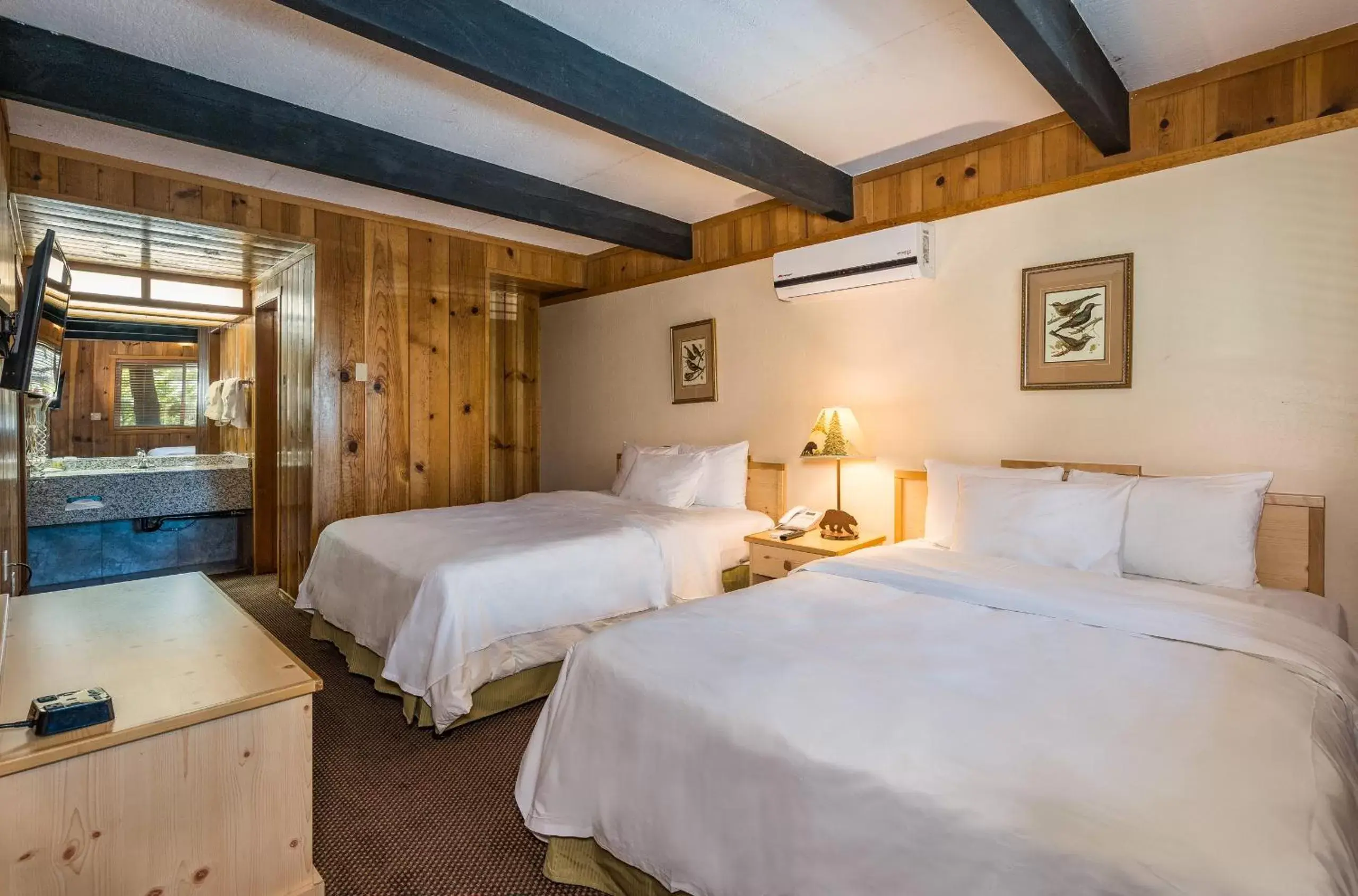 Deluxe Queen Room with Two Queen Beds in The Pines Resort & Conference Center Deluxe Queen Room with Two Queen Beds in The Pines Resort & Conference Center