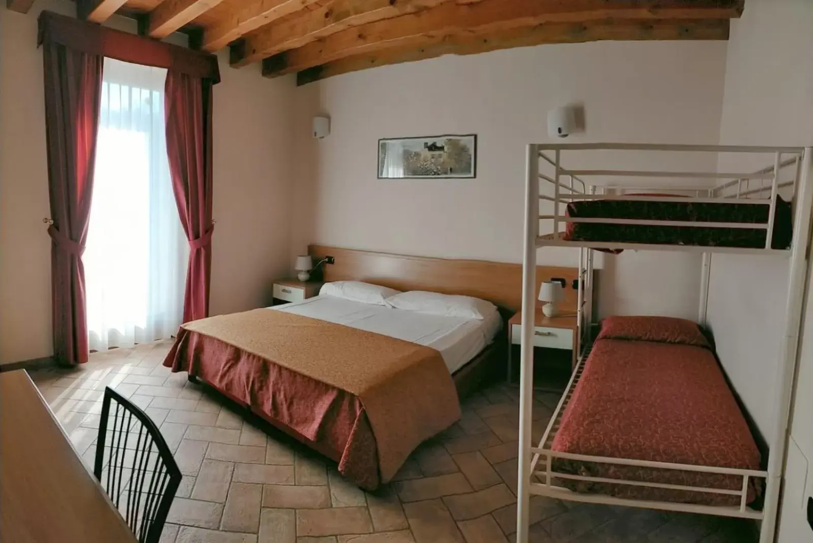 Classic Quadruple Room in Hotel Agli Ulivi Classic Quadruple Room in Hotel Agli Ulivi