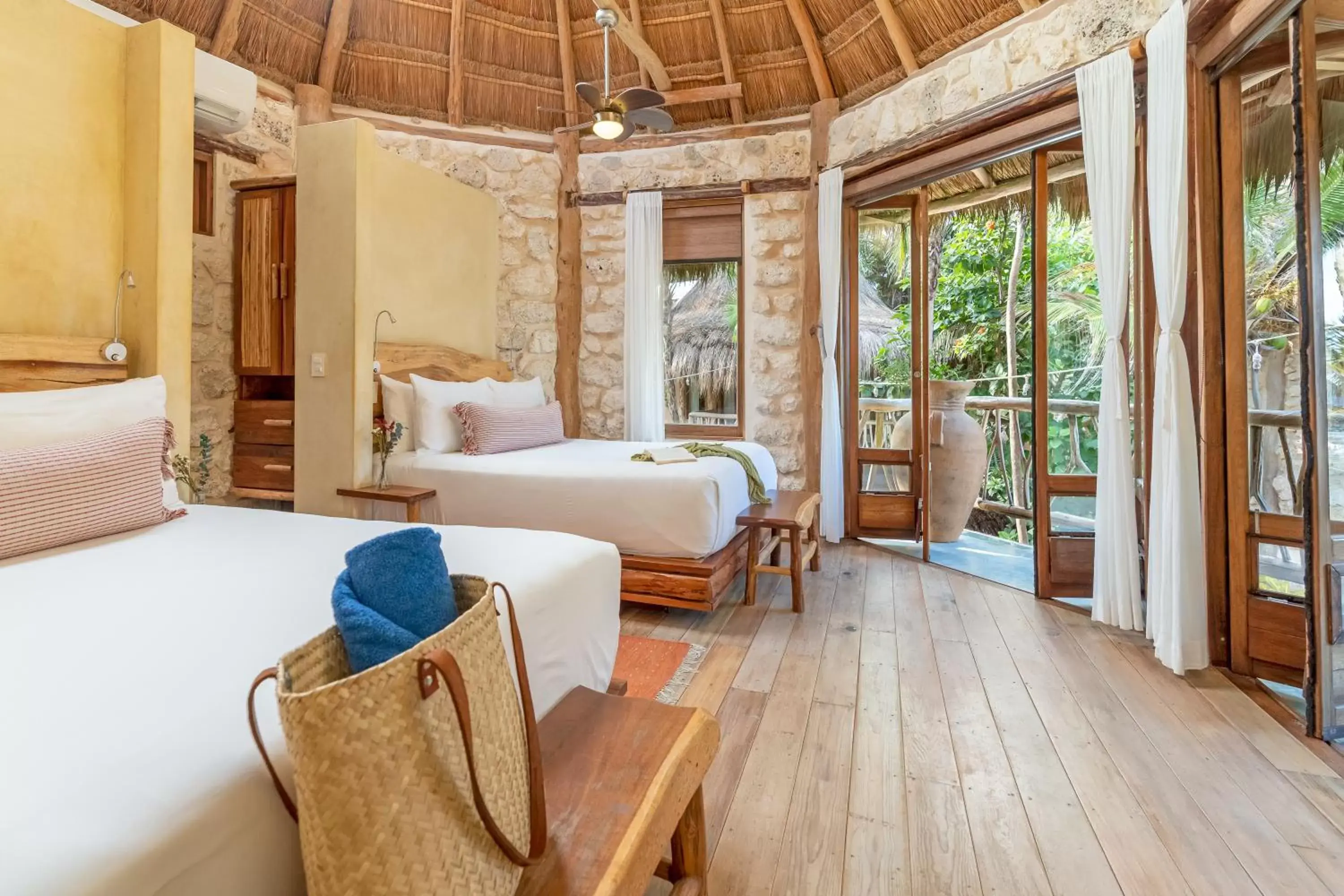 Partial Ocean View Deluxe Suite in Alaya Tulum by Ahau Collection Partial Ocean View Deluxe Suite in Alaya Tulum by Ahau Collection