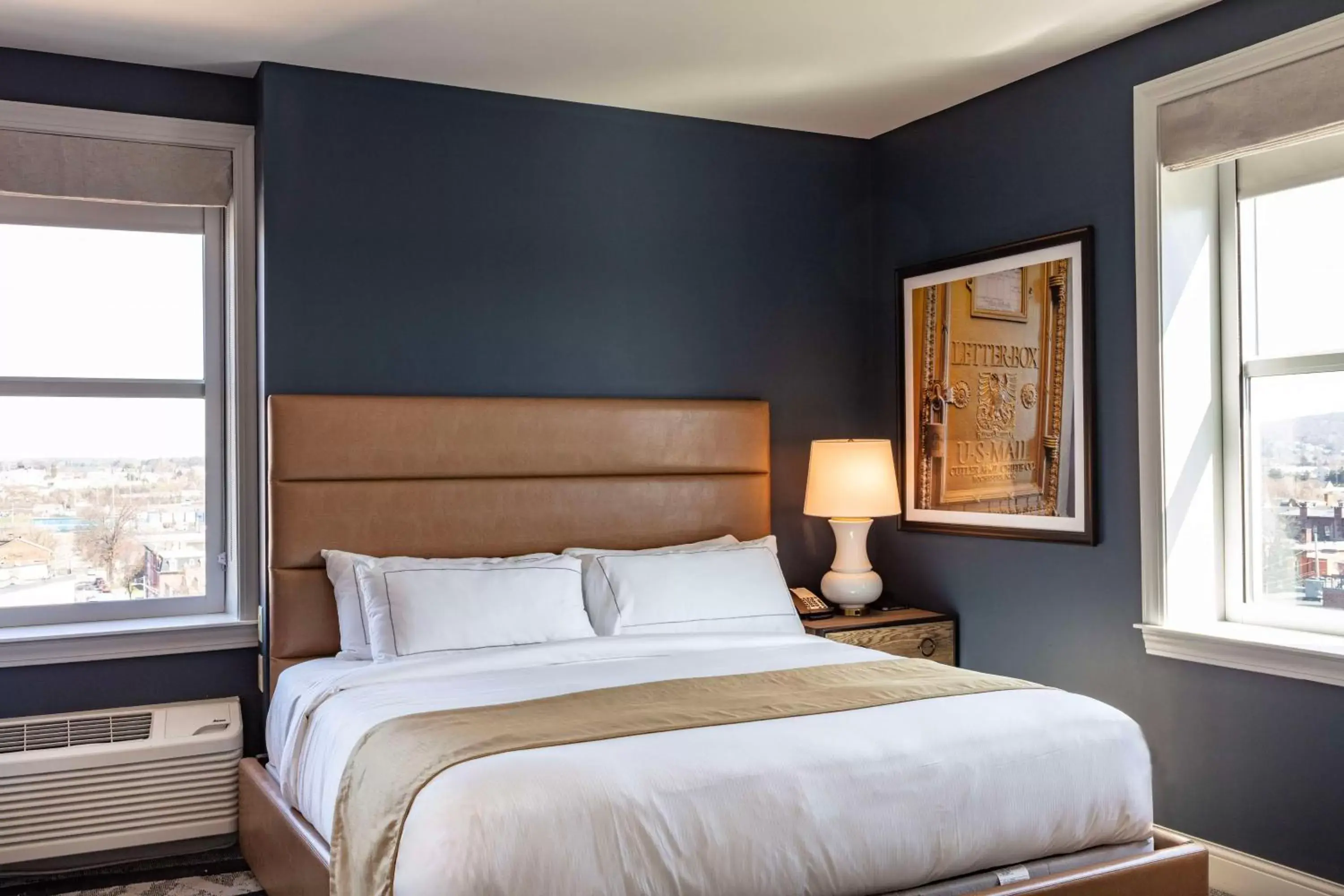 Junior King Suite with Sofa Bed in The Yorktowne Hotel, Tapestry Collection by Hilton Junior King Suite with Sofa Bed in The Yorktowne Hotel, Tapestry Collection by Hilton