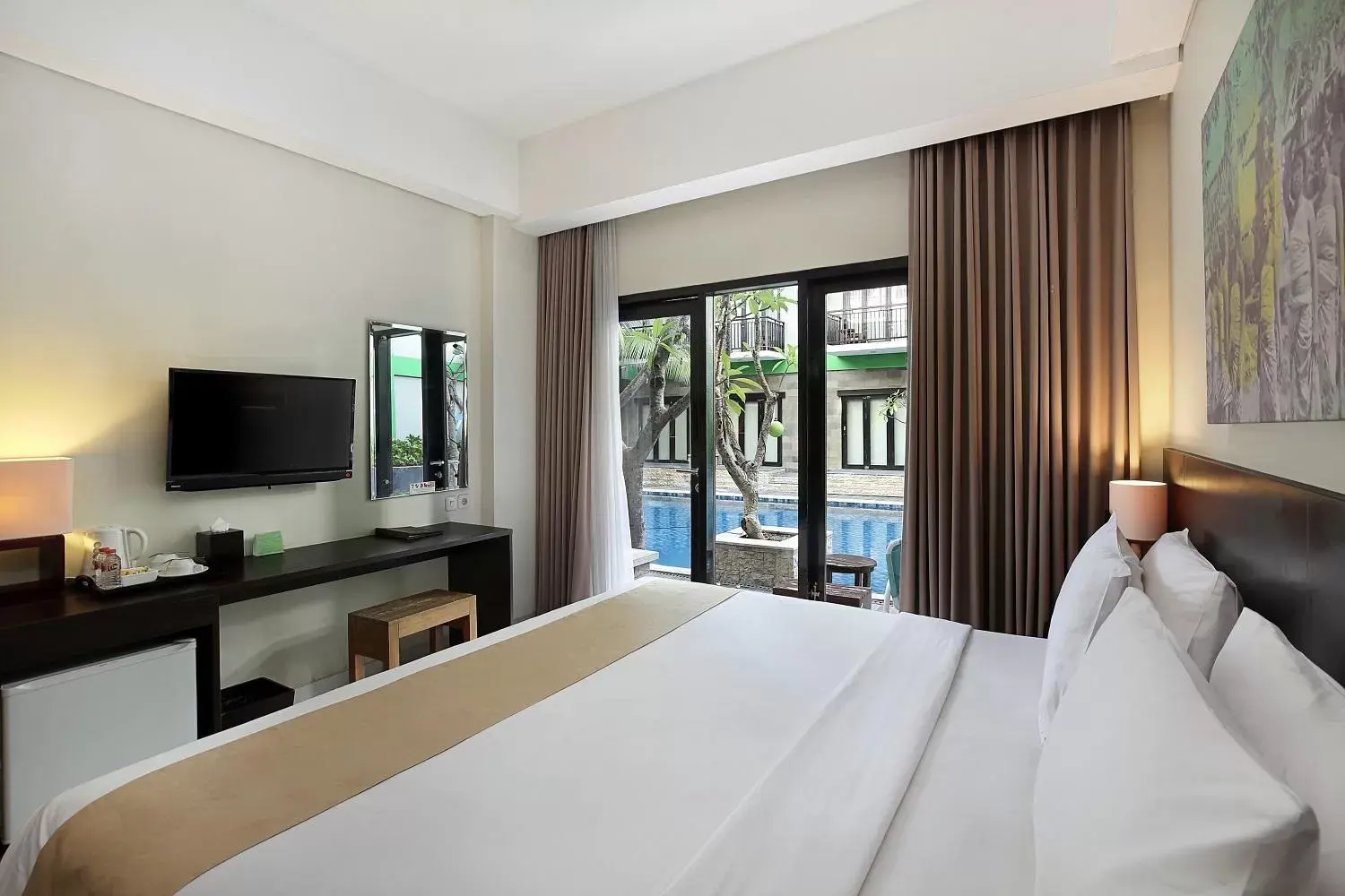 Deluxe Double Room Poolside in Rofa Kuta Hotel - CHSE Certified Deluxe Double Room Poolside in Rofa Kuta Hotel - CHSE Certified