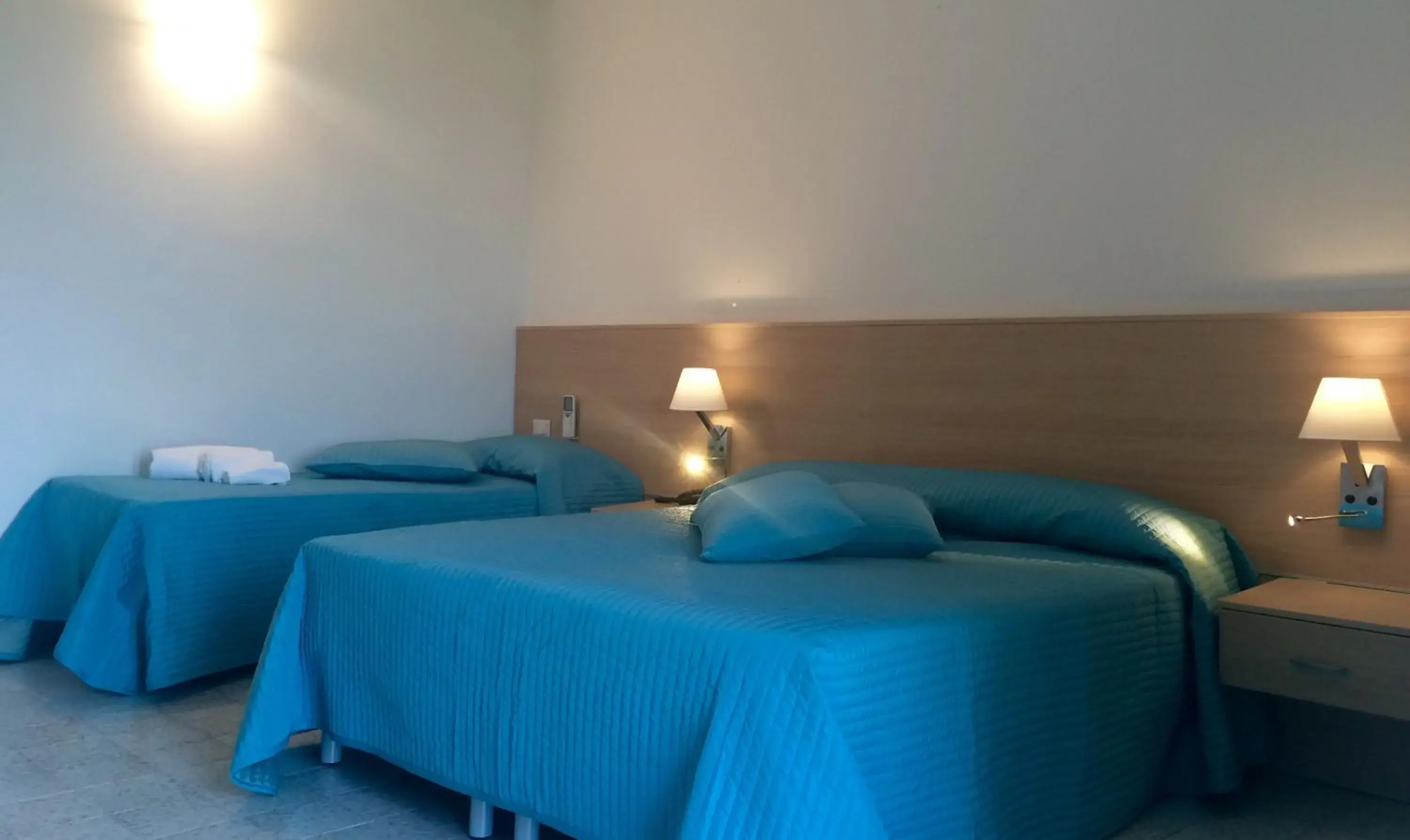 Classic Triple Room in La Cantinella Classic Triple Room in La Cantinella