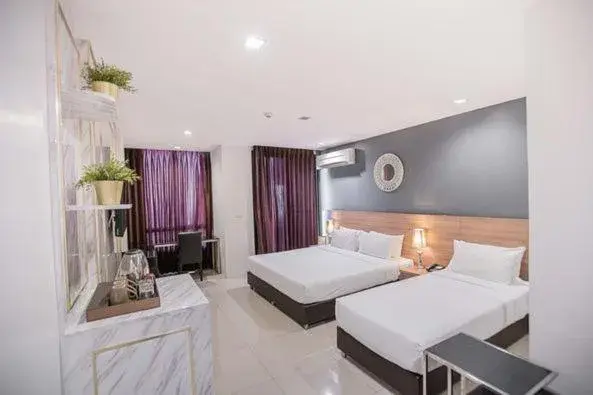 Executive Triple Room in Marigold Sukhumvit Executive Triple Room in Marigold Sukhumvit