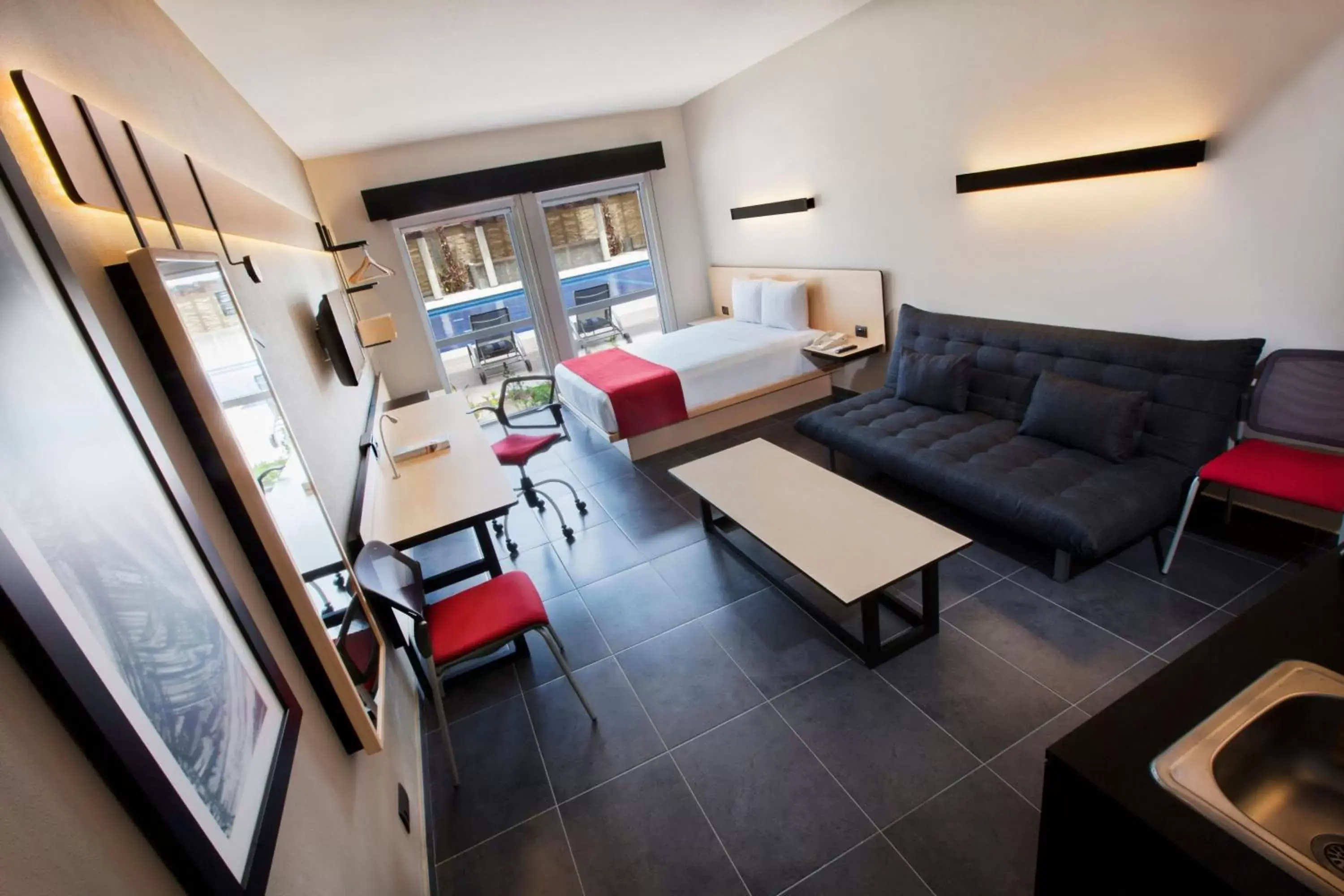 Superior Queen Room with Sofa Bed in City Express Plus by Marriott Cabo San Lucas Superior Queen Room with Sofa Bed in City Express Plus by Marriott Cabo San Lucas