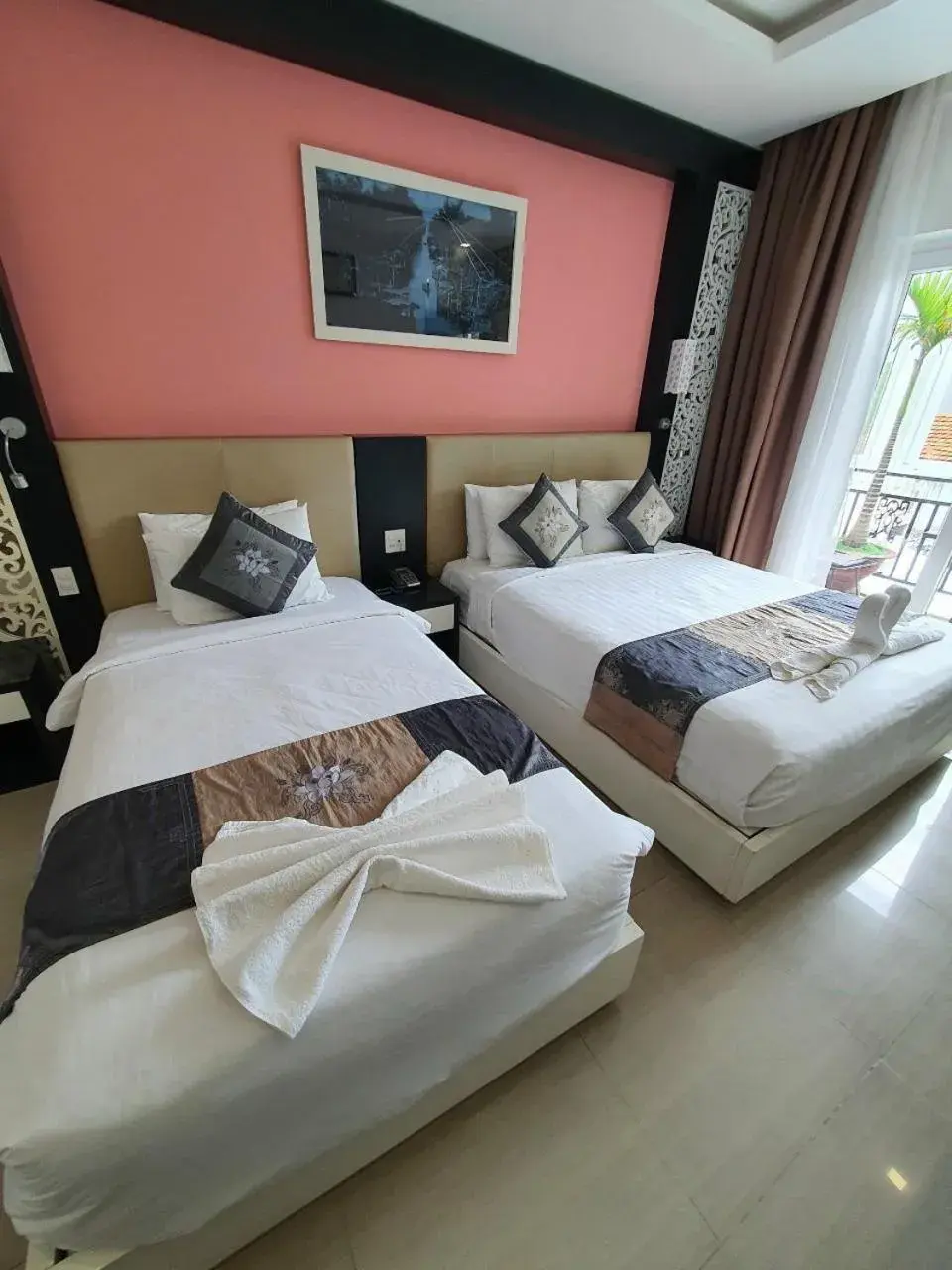 Deluxe Triple Room in Muine Sports Hotel Deluxe Triple Room in Muine Sports Hotel