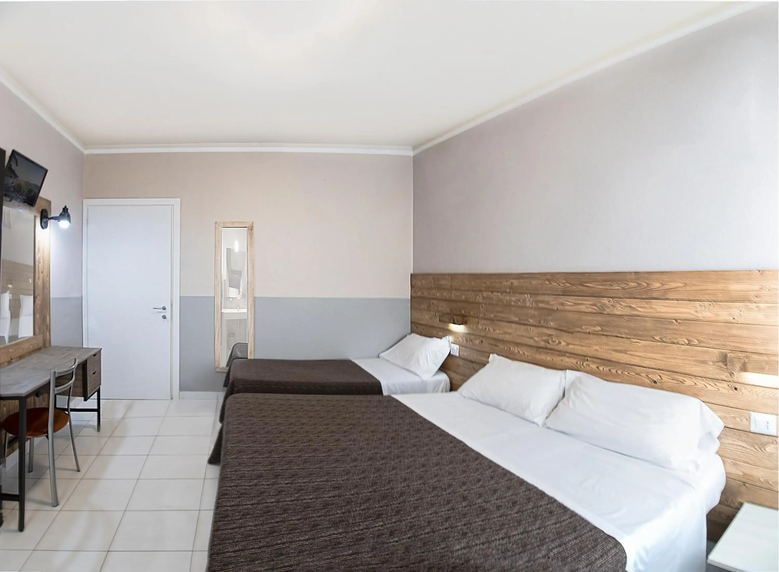 Triple Room in Albergo Serena Triple Room in Albergo Serena