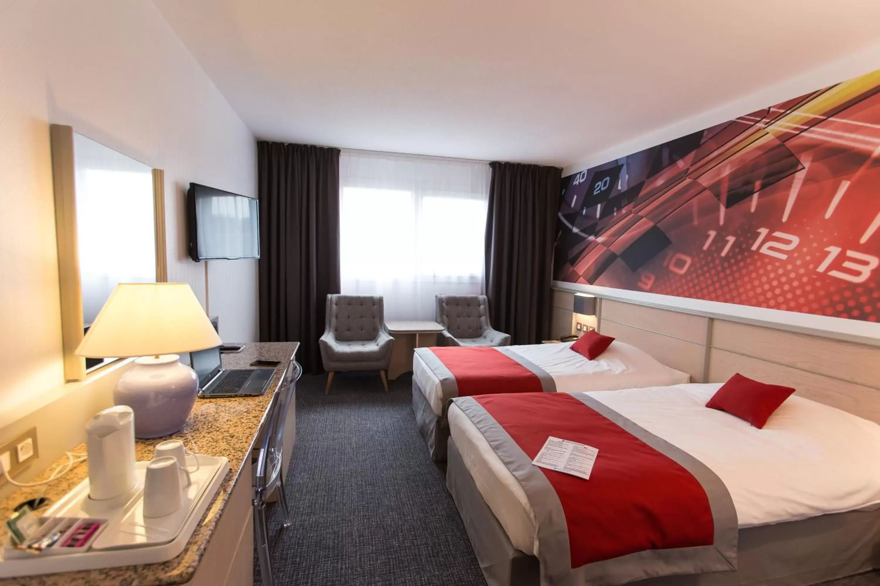 Twin Room in Hotel Le Paddock Twin Room in Hotel Le Paddock