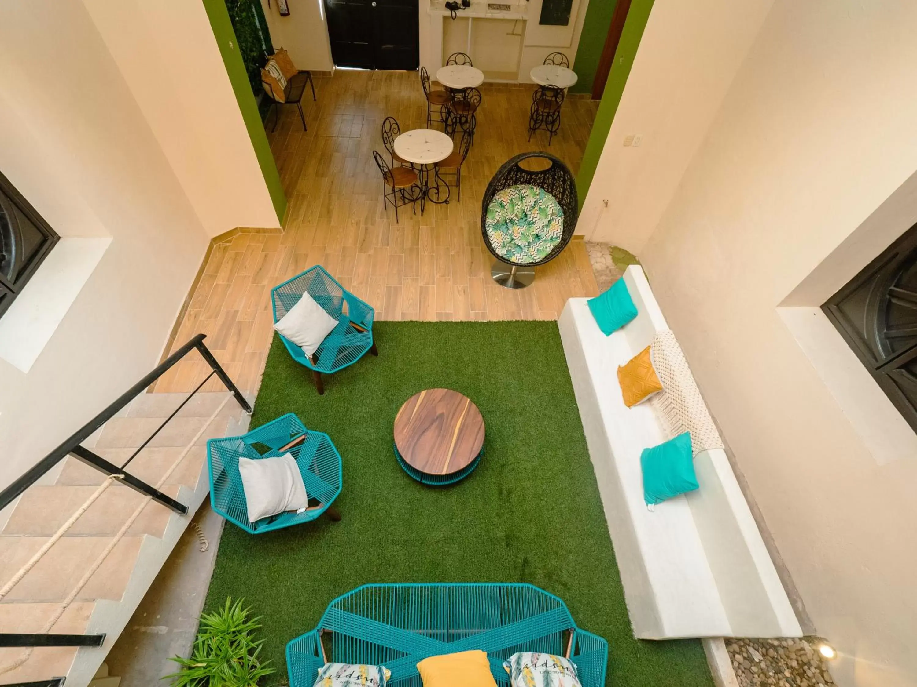 Communal lounge/ TV room in Nido Colibrí - Zona Remate de Paseo Montejo Communal lounge/ TV room in Nido Colibrí - Zona Remate de Paseo Montejo