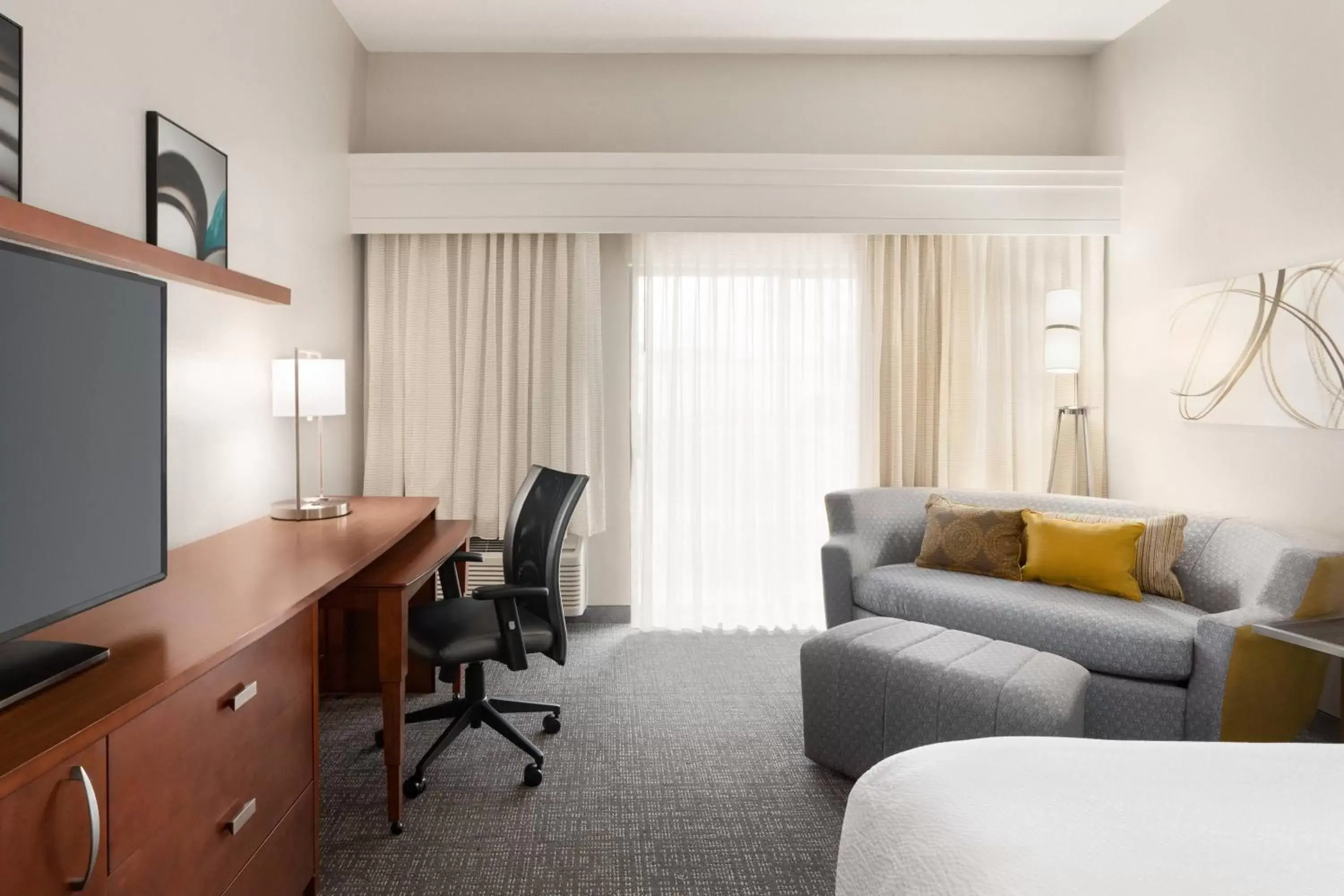 One-Bedroom King Suite with Sofa Bed and Courtyard View in Courtyard Tupelo One-Bedroom King Suite with Sofa Bed and Courtyard View in Courtyard Tupelo