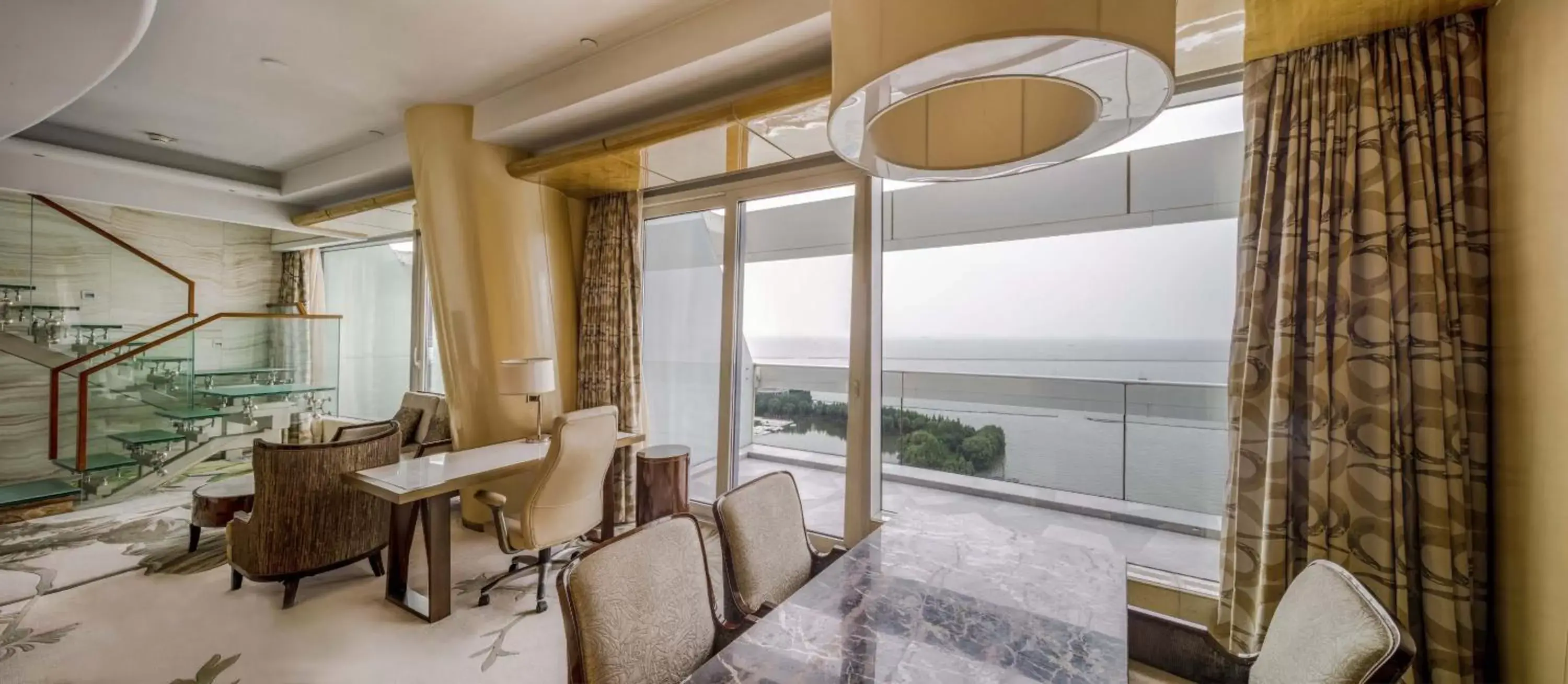 One-Bedroom Bi-Level Suite with Lake View in Sheraton Huzhou Taihu Lake Hot Spring Resort & Spa One-Bedroom Bi-Level Suite with Lake View in Sheraton Huzhou Taihu Lake Hot Spring Resort & Spa