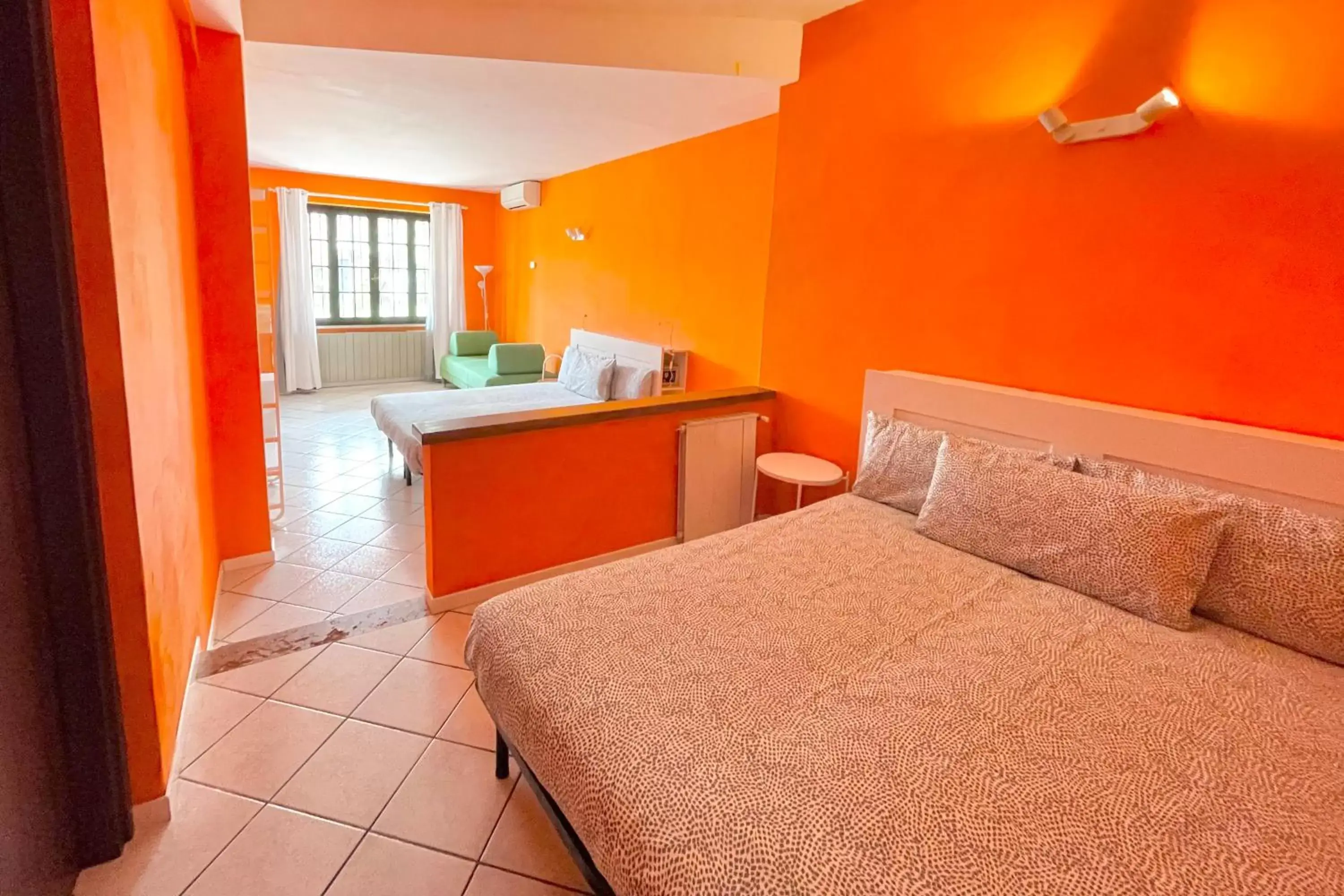 Quintuple Room with Garden View in Albergo Vittoria Quintuple Room with Garden View in Albergo Vittoria