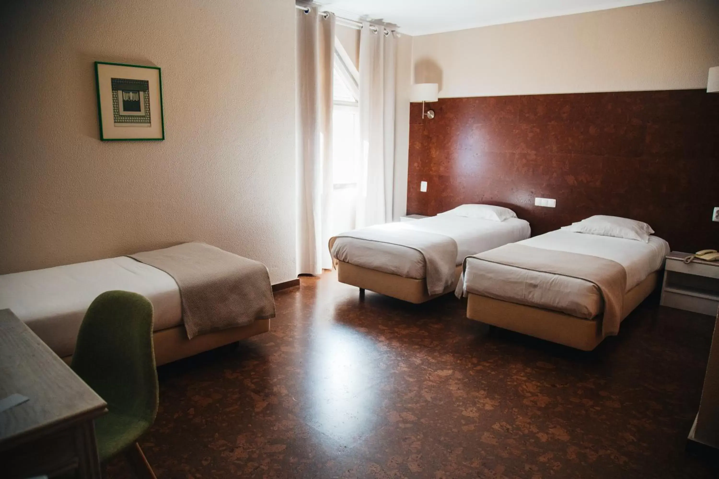 Triple Room in Hotel Laitau Triple Room in Hotel Laitau