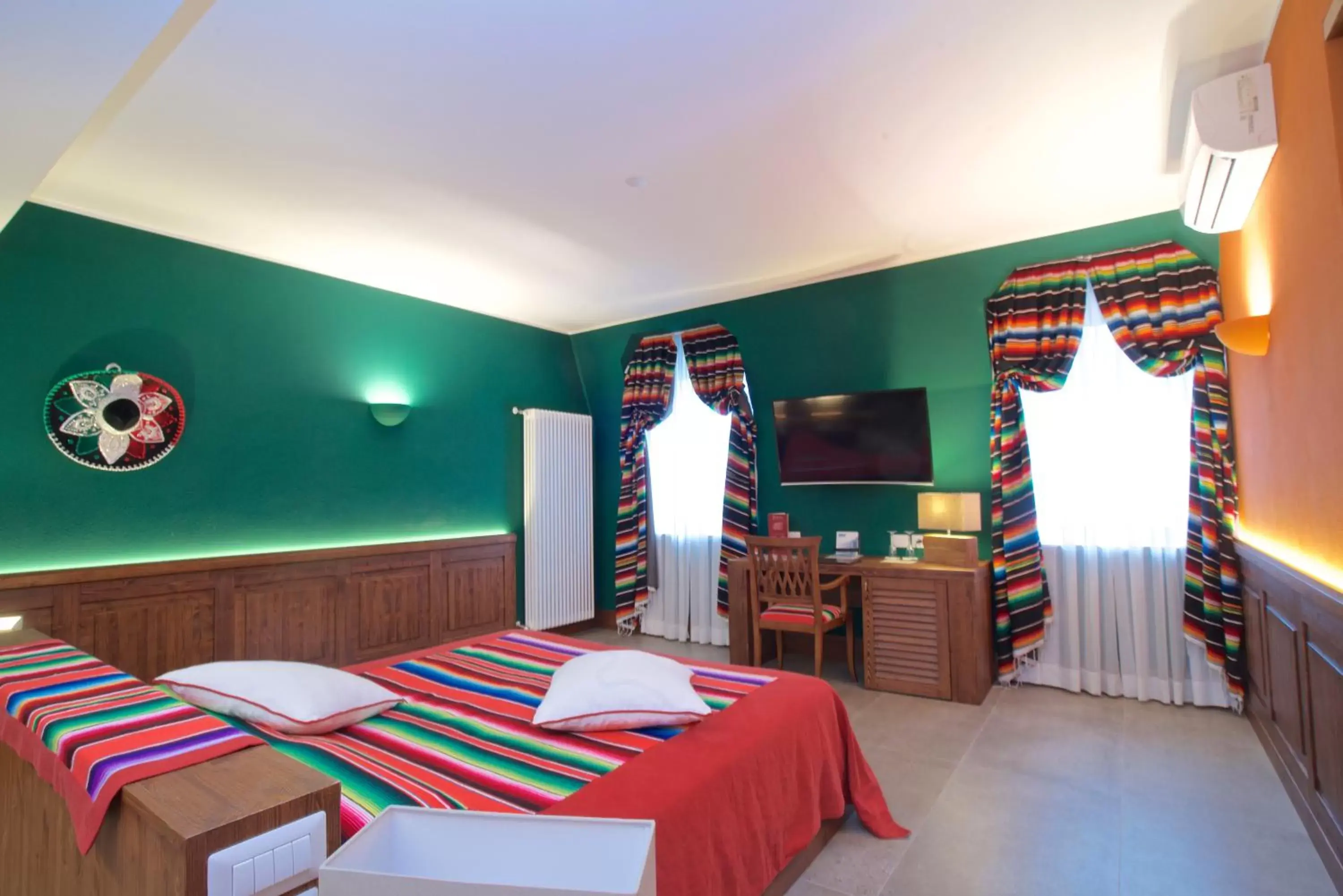 Superior Quadruple Room in Design Suite Tirano Superior Quadruple Room in Design Suite Tirano