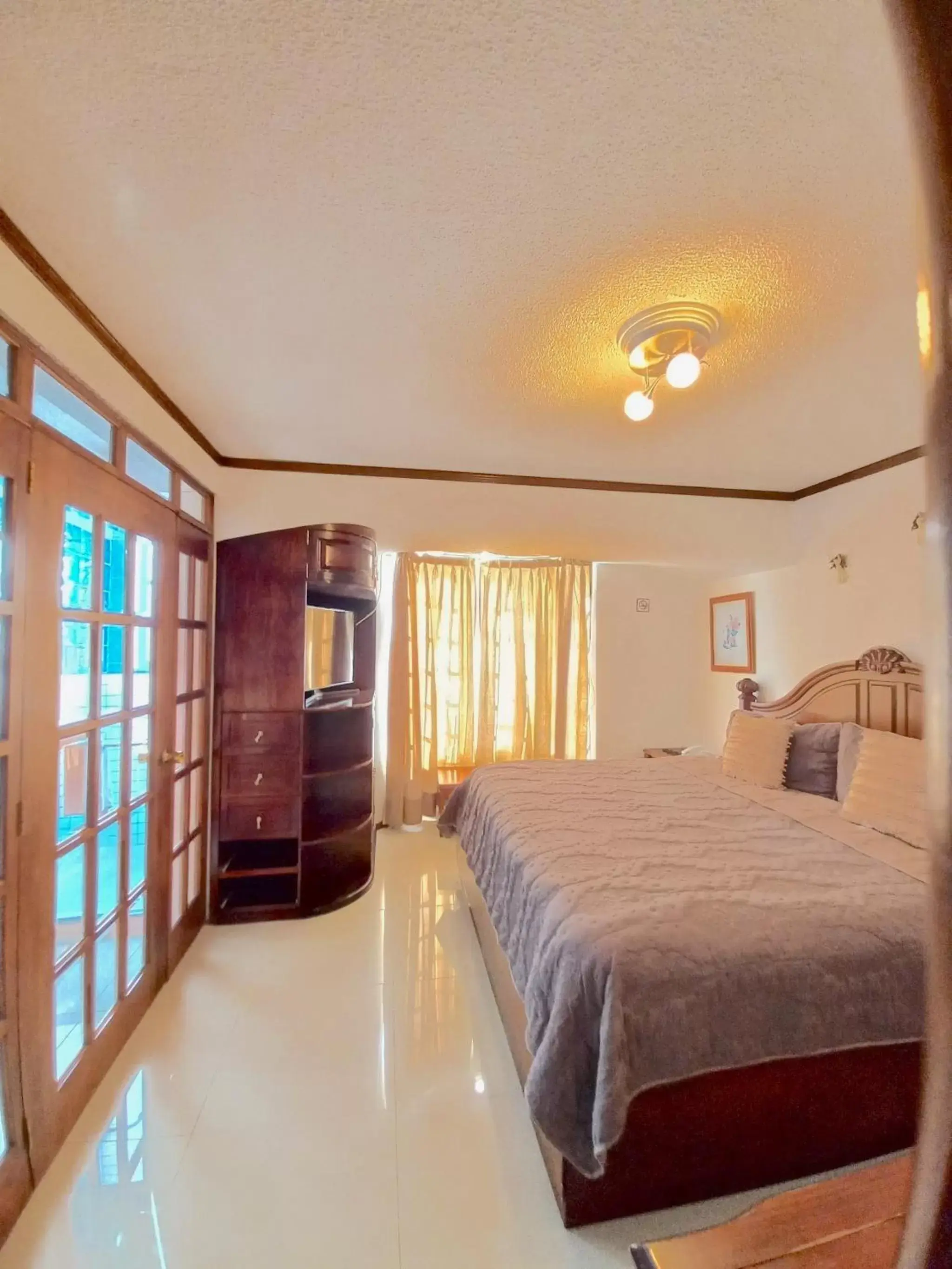 Junior Suite with Garden View in La Aurora Hotel Like Home Junior Suite with Garden View in La Aurora Hotel Like Home