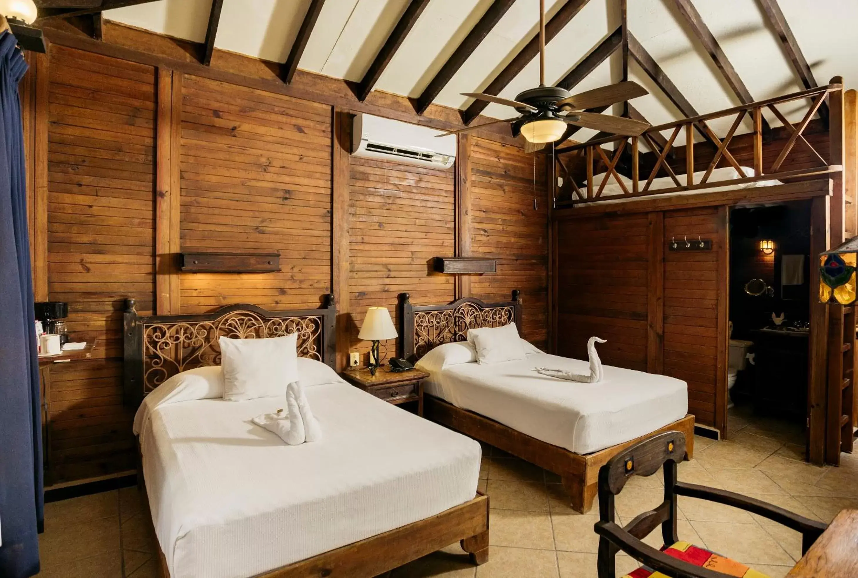 Ocean view Bungalow - Double Beds in Petit Lafitte Beach Front Hotel & Bungalows Ocean view Bungalow - Double Beds in Petit Lafitte Beach Front Hotel & Bungalows