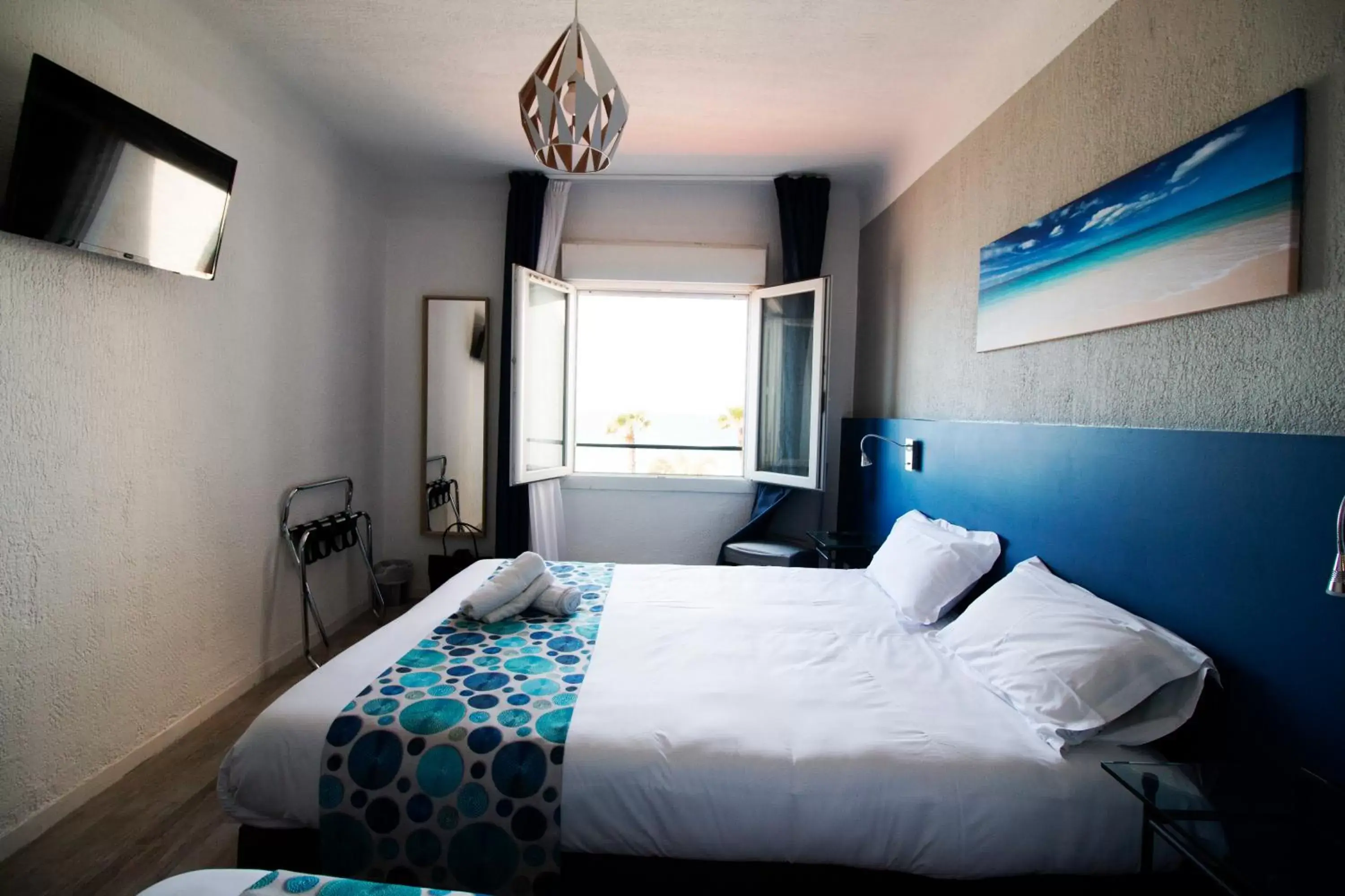 Triple Room in Hôtel Bel Azur Triple Room in Hôtel Bel Azur