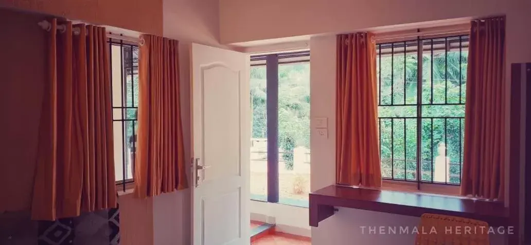 Deluxe Double Room (2 Adults + 1 Child) in Thenmala Heritage Deluxe Double Room (2 Adults + 1 Child) in Thenmala Heritage