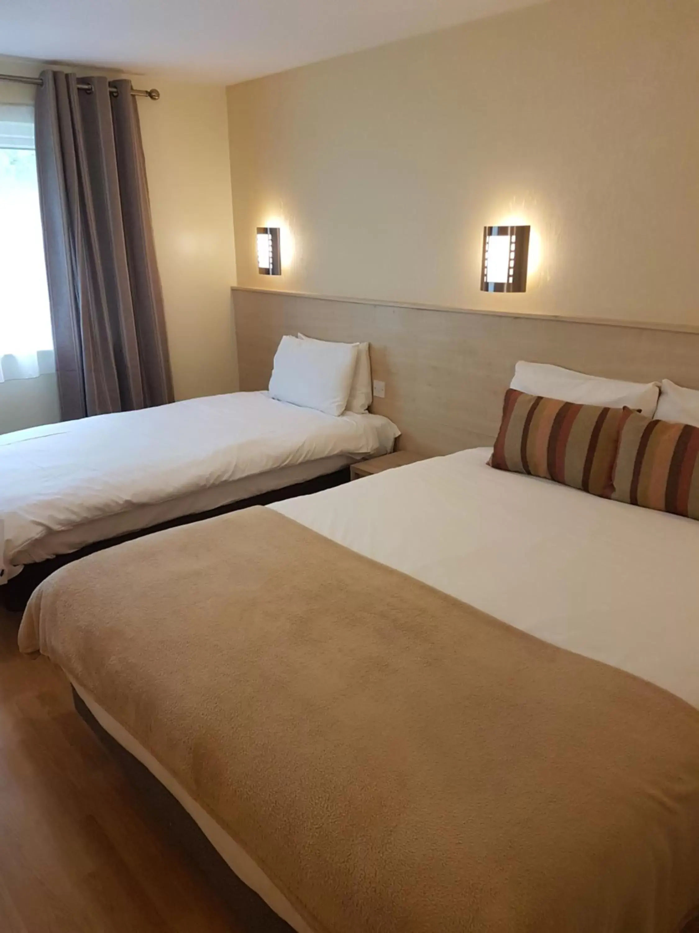 Family Room (3 Adults) in Travel Plaza Hotel Family Room (3 Adults) in Travel Plaza Hotel