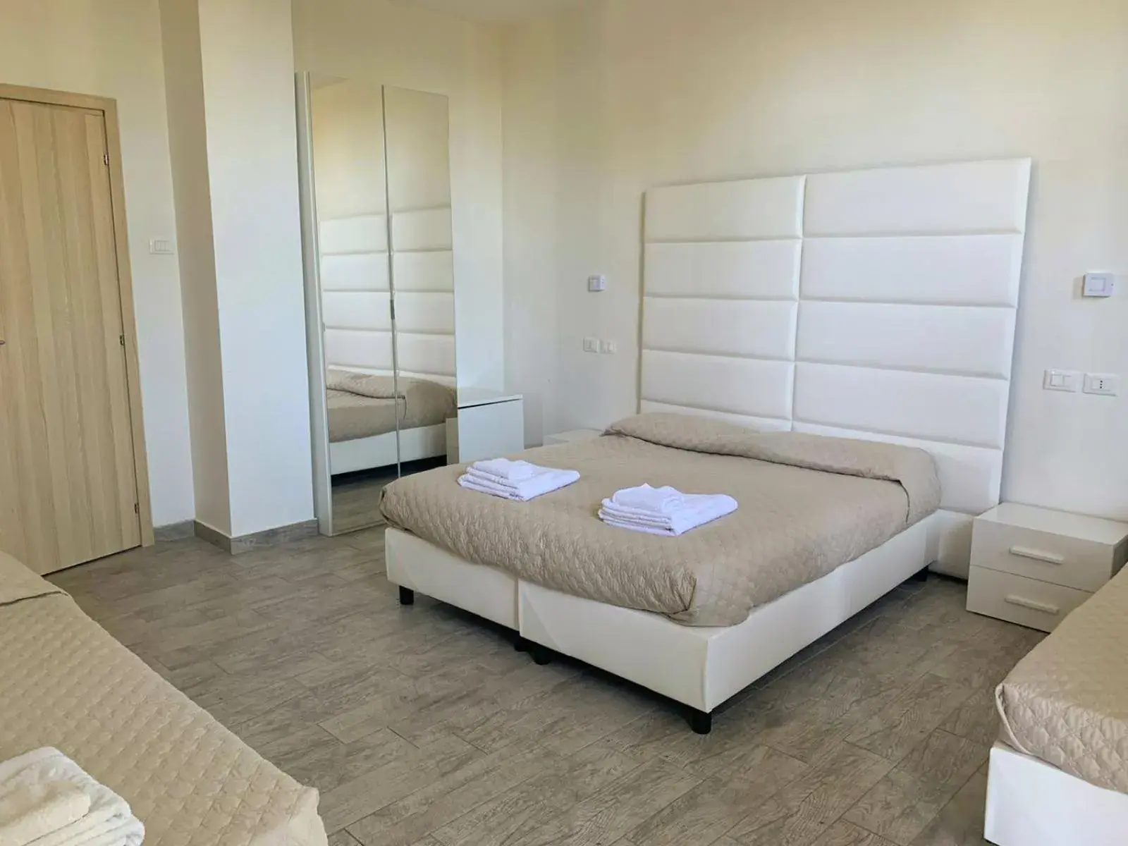 Quadruple Room in Hotel Artemide Mare Quadruple Room in Hotel Artemide Mare